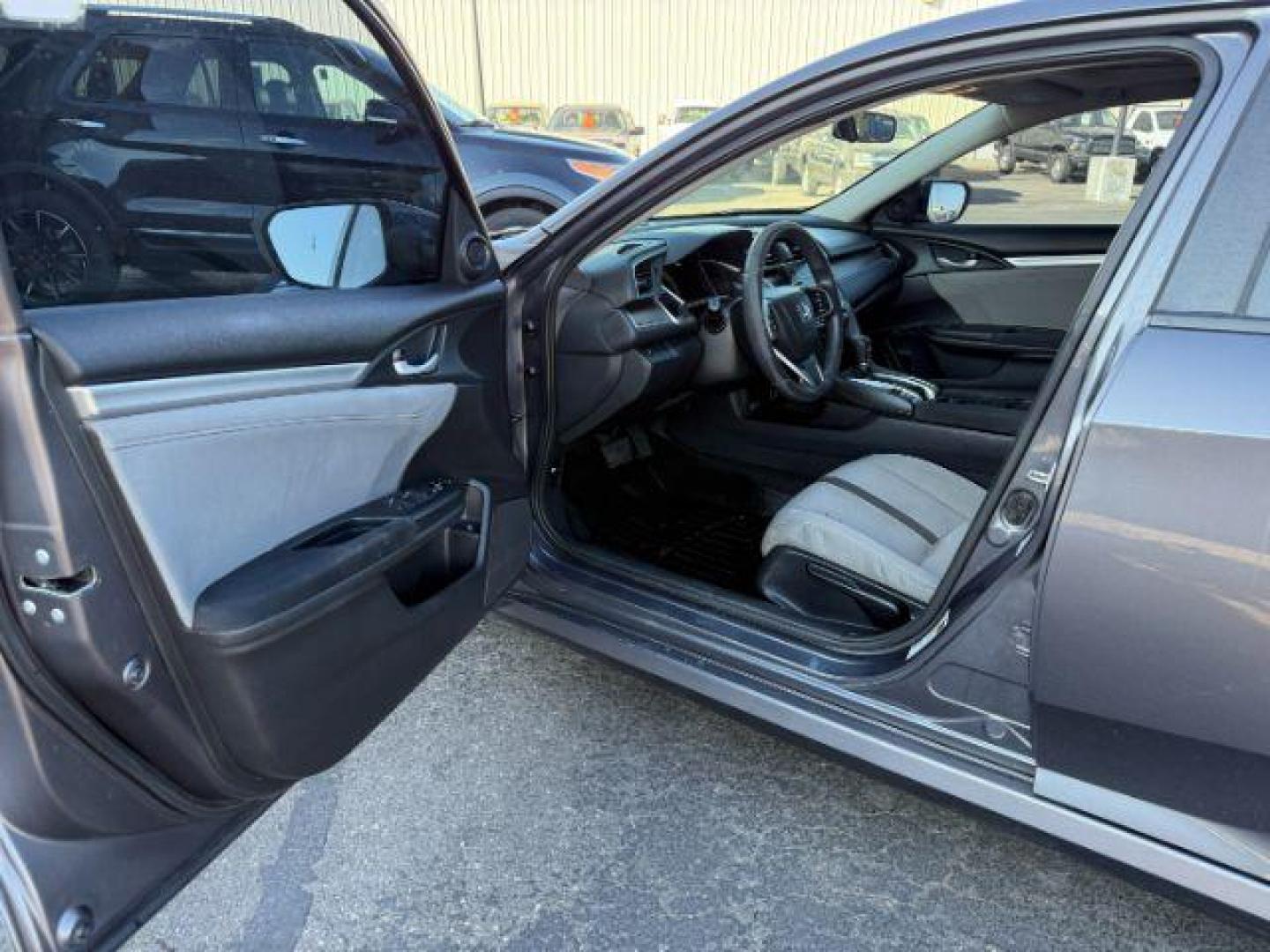 2017 GRAY /Black Honda Civic (19XFC1F35HE) with an 15L I-4 gasoline direct injection engine, Automatic transmission, located at 1175 N Woodruff Ave, Idaho Falls, ID, 83401, 43.506901, -111.999657 - At Timberline Auto, finding a great deal on your next vehicle is always easy! Our experienced sales staff's goal is to help find you the right vehicle at the right price! Our knowledgeable finance department has options for almost any credit score. We offer extended service contract options to prote - Photo#31