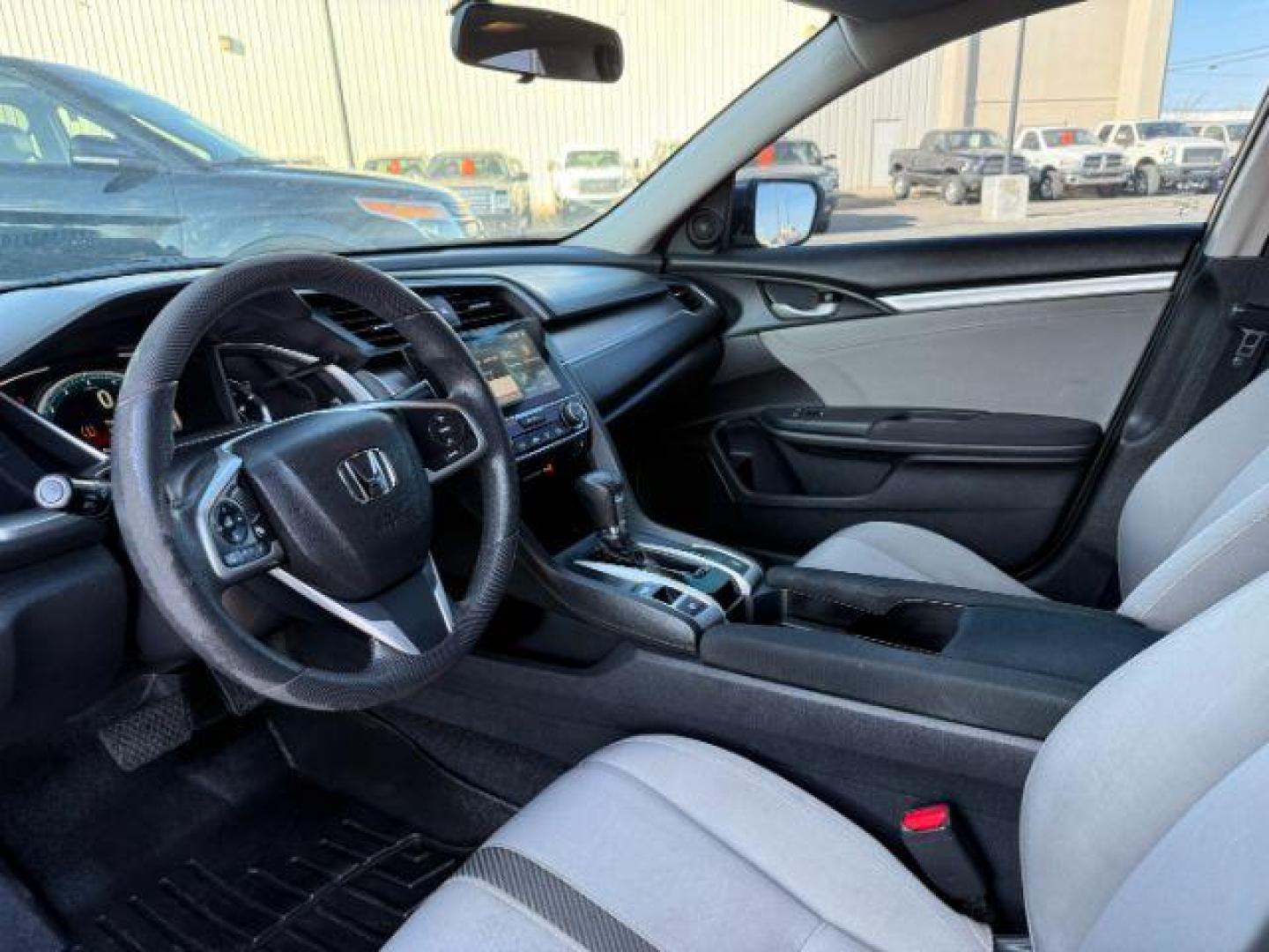 2017 GRAY /Black Honda Civic (19XFC1F35HE) with an 15L I-4 gasoline direct injection engine, Automatic transmission, located at 1175 N Woodruff Ave, Idaho Falls, ID, 83401, 43.506901, -111.999657 - At Timberline Auto, finding a great deal on your next vehicle is always easy! Our experienced sales staff's goal is to help find you the right vehicle at the right price! Our knowledgeable finance department has options for almost any credit score. We offer extended service contract options to prote - Photo#33