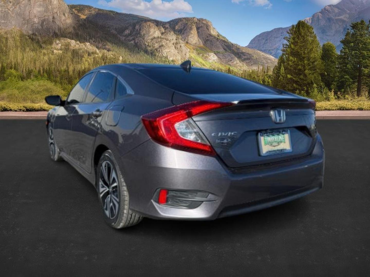 2017 GRAY /Black Honda Civic (19XFC1F35HE) with an 15L I-4 gasoline direct injection engine, Automatic transmission, located at 1175 N Woodruff Ave, Idaho Falls, ID, 83401, 43.506901, -111.999657 - At Timberline Auto, finding a great deal on your next vehicle is always easy! Our experienced sales staff's goal is to help find you the right vehicle at the right price! Our knowledgeable finance department has options for almost any credit score. We offer extended service contract options to prote - Photo#2