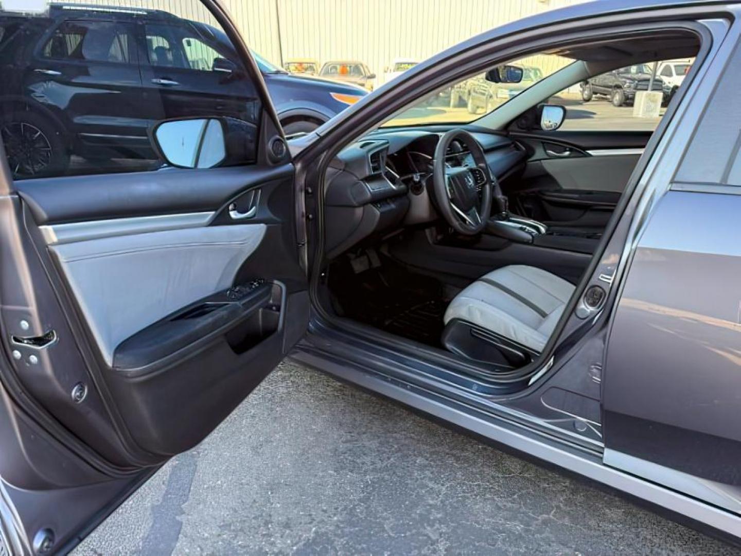 2017 GRAY /Black Honda Civic (19XFC1F35HE) with an 15L I-4 gasoline direct injection engine, Automatic transmission, located at 1175 N Woodruff Ave, Idaho Falls, ID, 83401, 43.506901, -111.999657 - At Timberline Auto, finding a great deal on your next vehicle is always easy! Our experienced sales staff's goal is to help find you the right vehicle at the right price! Our knowledgeable finance department has options for almost any credit score. We offer extended service contract options to prote - Photo#10