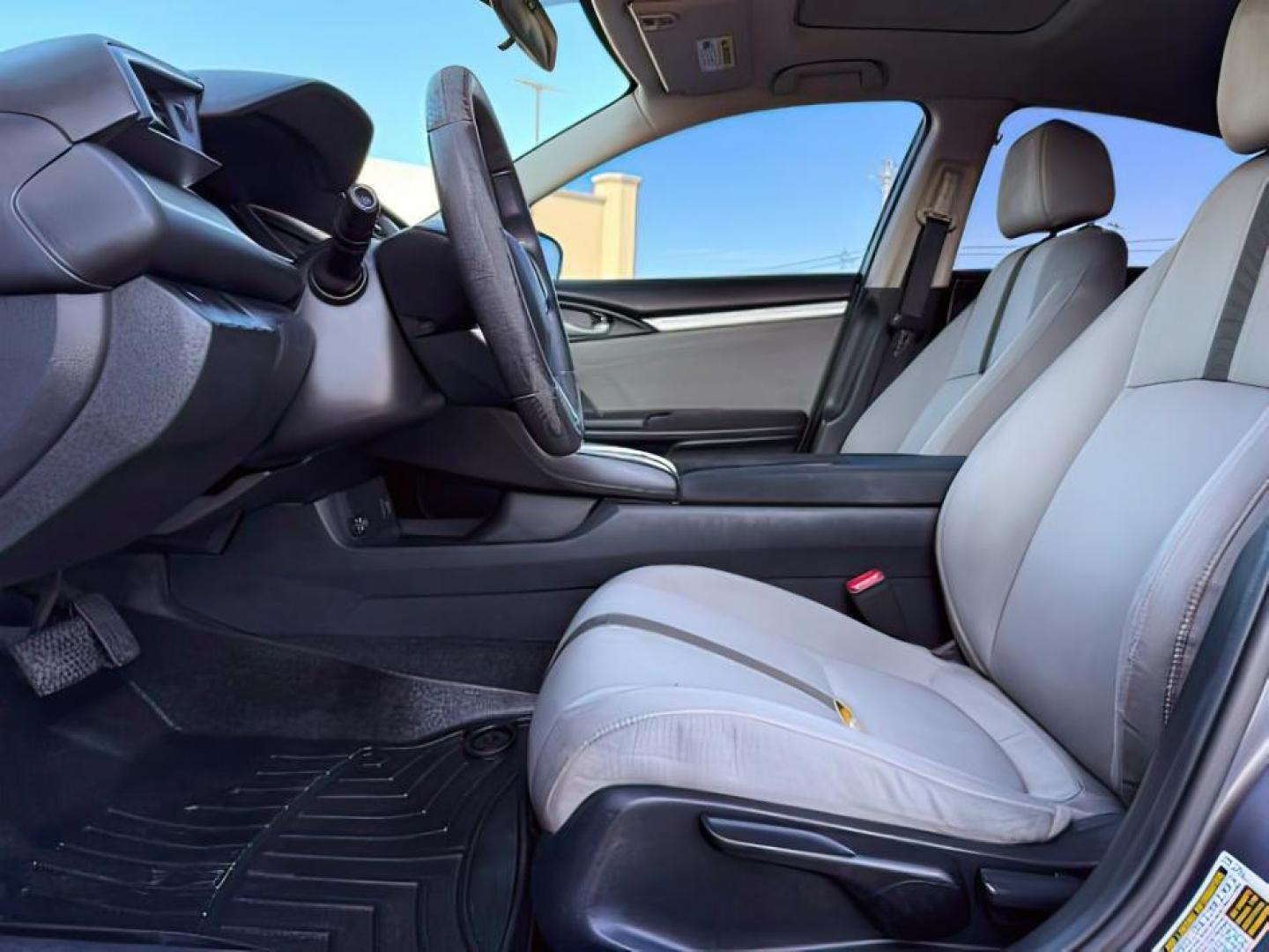 2017 GRAY /Black Honda Civic (19XFC1F35HE) with an 15L I-4 gasoline direct injection engine, Automatic transmission, located at 1175 N Woodruff Ave, Idaho Falls, ID, 83401, 43.506901, -111.999657 - At Timberline Auto, finding a great deal on your next vehicle is always easy! Our experienced sales staff's goal is to help find you the right vehicle at the right price! Our knowledgeable finance department has options for almost any credit score. We offer extended service contract options to prote - Photo#11