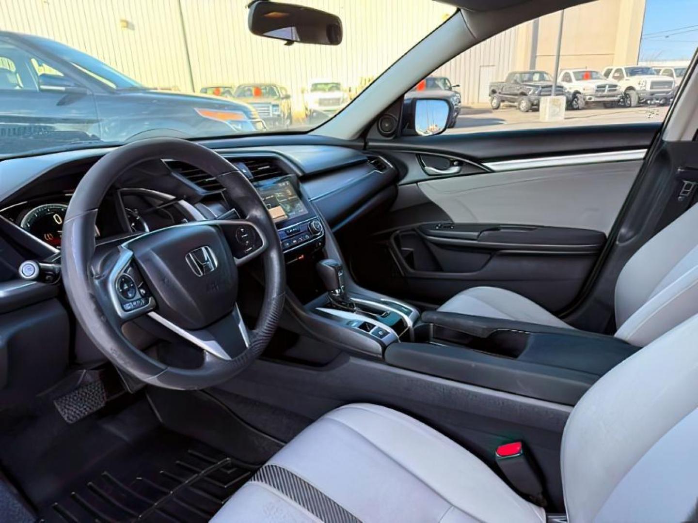 2017 GRAY /Black Honda Civic (19XFC1F35HE) with an 15L I-4 gasoline direct injection engine, Automatic transmission, located at 1175 N Woodruff Ave, Idaho Falls, ID, 83401, 43.506901, -111.999657 - At Timberline Auto, finding a great deal on your next vehicle is always easy! Our experienced sales staff's goal is to help find you the right vehicle at the right price! Our knowledgeable finance department has options for almost any credit score. We offer extended service contract options to prote - Photo#12