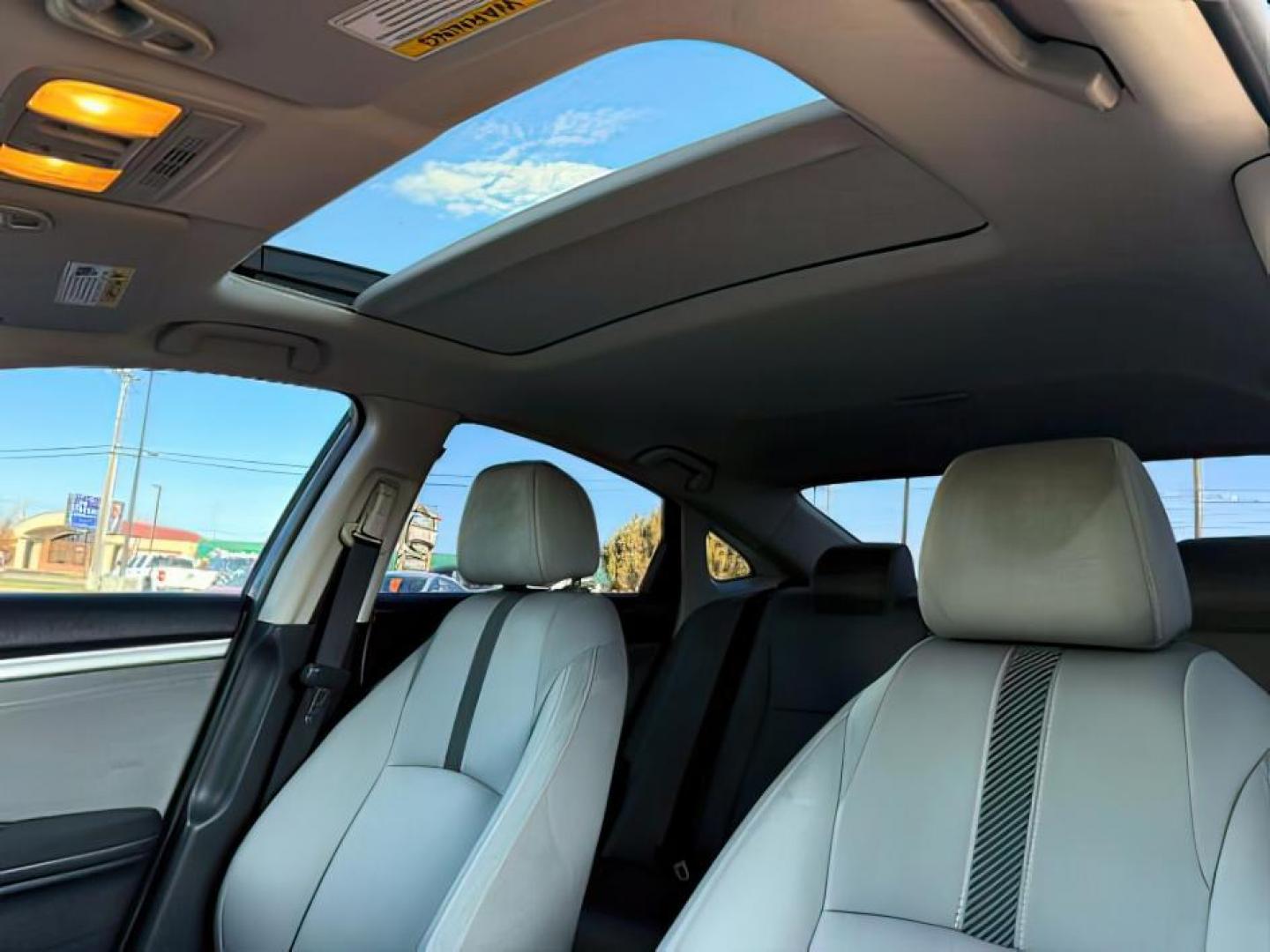 2017 GRAY /Black Honda Civic (19XFC1F35HE) with an 15L I-4 gasoline direct injection engine, Automatic transmission, located at 1175 N Woodruff Ave, Idaho Falls, ID, 83401, 43.506901, -111.999657 - At Timberline Auto, finding a great deal on your next vehicle is always easy! Our experienced sales staff's goal is to help find you the right vehicle at the right price! Our knowledgeable finance department has options for almost any credit score. We offer extended service contract options to prote - Photo#17