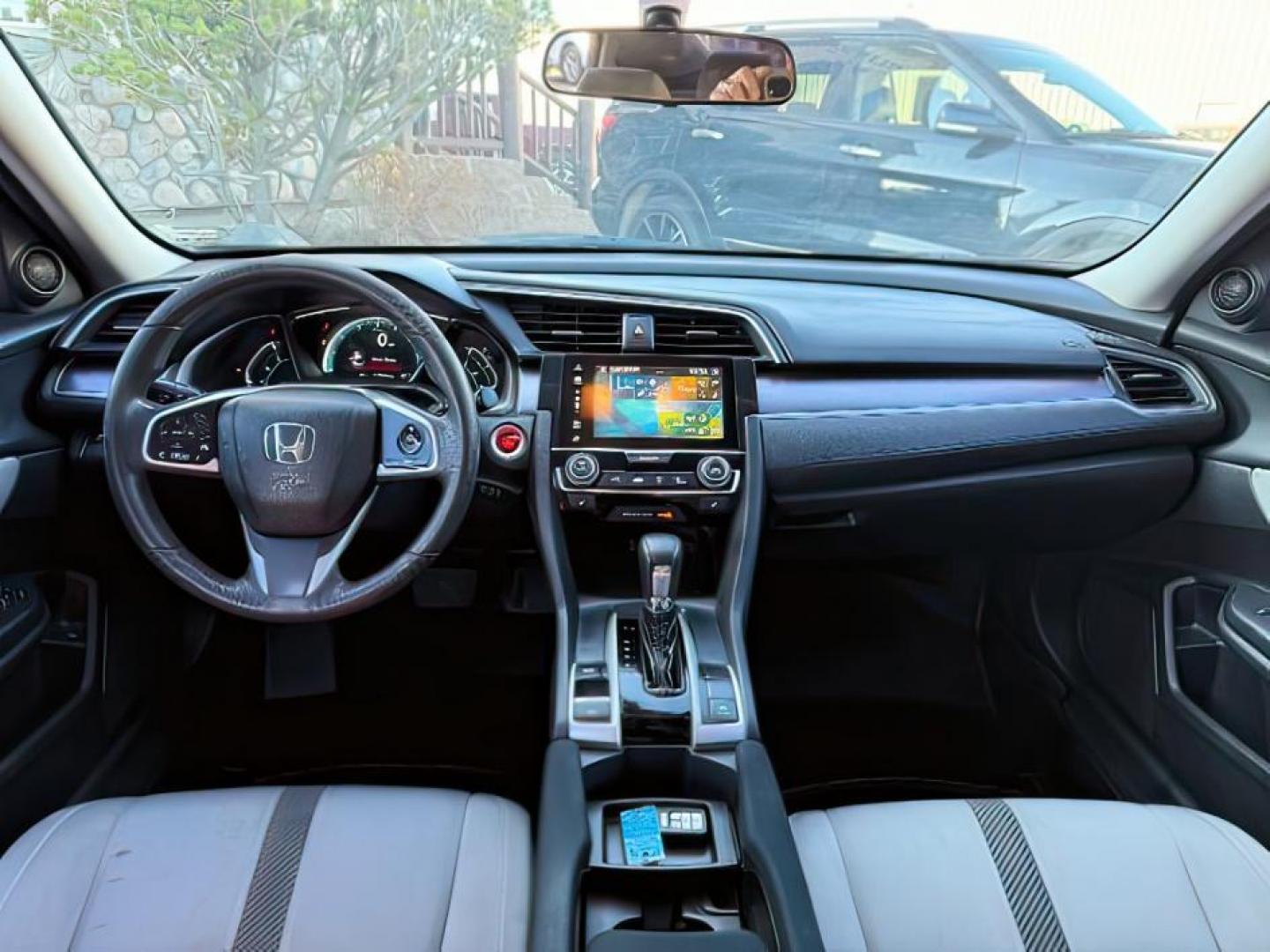 2017 GRAY /Black Honda Civic (19XFC1F35HE) with an 15L I-4 gasoline direct injection engine, Automatic transmission, located at 1175 N Woodruff Ave, Idaho Falls, ID, 83401, 43.506901, -111.999657 - At Timberline Auto, finding a great deal on your next vehicle is always easy! Our experienced sales staff's goal is to help find you the right vehicle at the right price! Our knowledgeable finance department has options for almost any credit score. We offer extended service contract options to prote - Photo#19