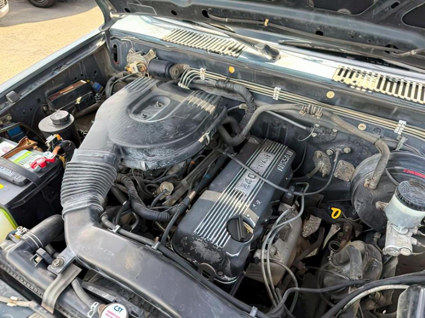 1993 SILVER /CLOTH Nissan 4x4 Truck (1N6SD11Y7PC) with an 24 engine, Manual transmission, located at 1175 N Woodruff Ave, Idaho Falls, ID, 83401, 43.506901, -111.999657 - At Timberline Auto, finding a great deal on your next vehicle is always easy! Our experienced sales staff's goal is to help find you the right vehicle at the right price! Our knowledgeable finance department has options for almost any credit score. We offer extended service contract options to prote - Photo#14