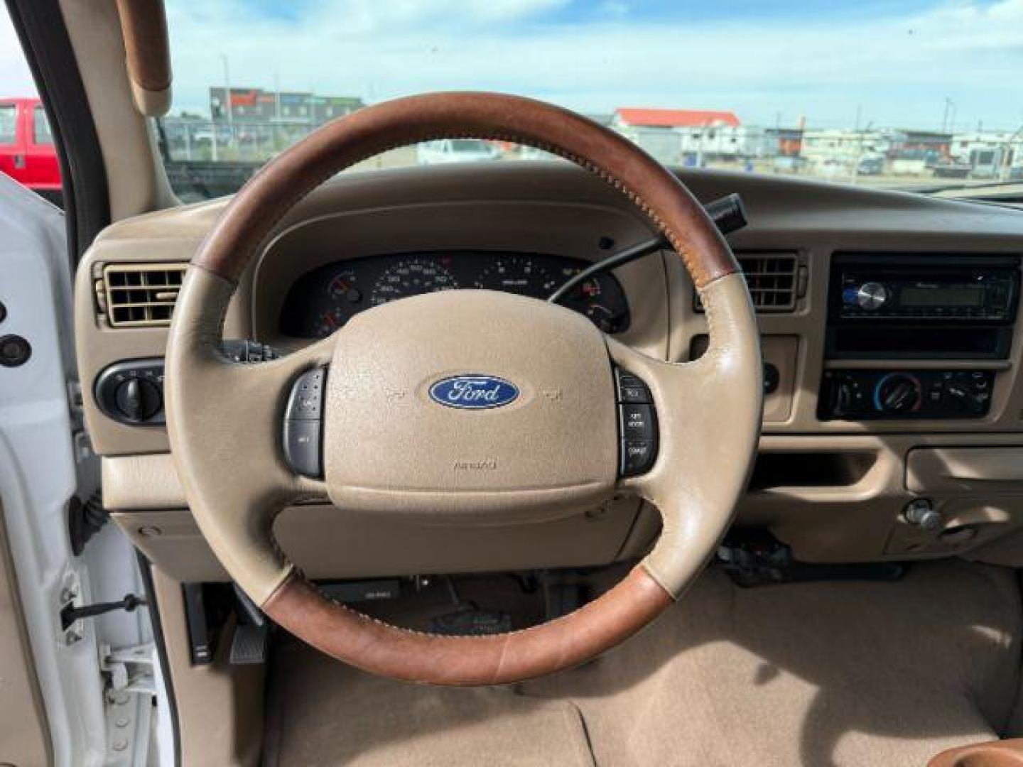 2003 Oxford White Clearcoat /Castano Brown Ford F-250 (1FTNW21P13E) with an Powerstroke 6L V-8 diesel direct injection engine, Automatic transmission, located at 1175 N Woodruff Ave, Idaho Falls, ID, 83401, 43.506901, -111.999657 - At Timberline Auto, finding a great deal on your next vehicle is always easy! Our experienced sales staff's goal is to help find you the right vehicle at the right price! Our knowledgeable finance department has options for almost any credit score. We offer extended service contract options to prote - Photo#35