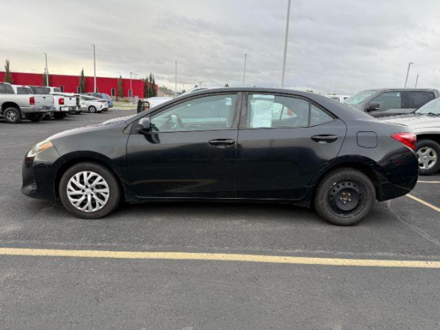 2018 BLACK /Steel Gray Toyota Corolla (5YFBURHE8JP) with an 18L I-4 DOHC engine, Automatic transmission, located at 1175 N Woodruff Ave, Idaho Falls, ID, 83401, 43.506901, -111.999657 - At Timberline Auto, finding a great deal on your next vehicle is always easy! Our experienced sales staff's goal is to help find you the right vehicle at the right price! Our knowledgeable finance department has options for almost any credit score. We offer extended service contract options to prote - Photo#1