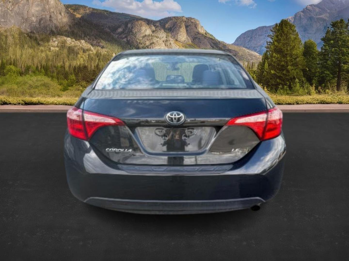 2018 BLACK /Steel Gray Toyota Corolla (5YFBURHE8JP) with an 18L I-4 DOHC engine, Automatic transmission, located at 1175 N Woodruff Ave, Idaho Falls, ID, 83401, 43.506901, -111.999657 - At Timberline Auto, finding a great deal on your next vehicle is always easy! Our experienced sales staff's goal is to help find you the right vehicle at the right price! Our knowledgeable finance department has options for almost any credit score. We offer extended service contract options to prote - Photo#3