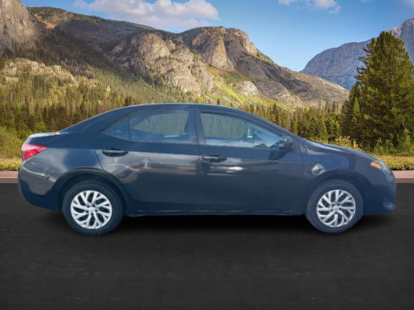 2018 BLACK /Steel Gray Toyota Corolla (5YFBURHE8JP) with an 18L I-4 DOHC engine, Automatic transmission, located at 1175 N Woodruff Ave, Idaho Falls, ID, 83401, 43.506901, -111.999657 - At Timberline Auto, finding a great deal on your next vehicle is always easy! Our experienced sales staff's goal is to help find you the right vehicle at the right price! Our knowledgeable finance department has options for almost any credit score. We offer extended service contract options to prote - Photo#5