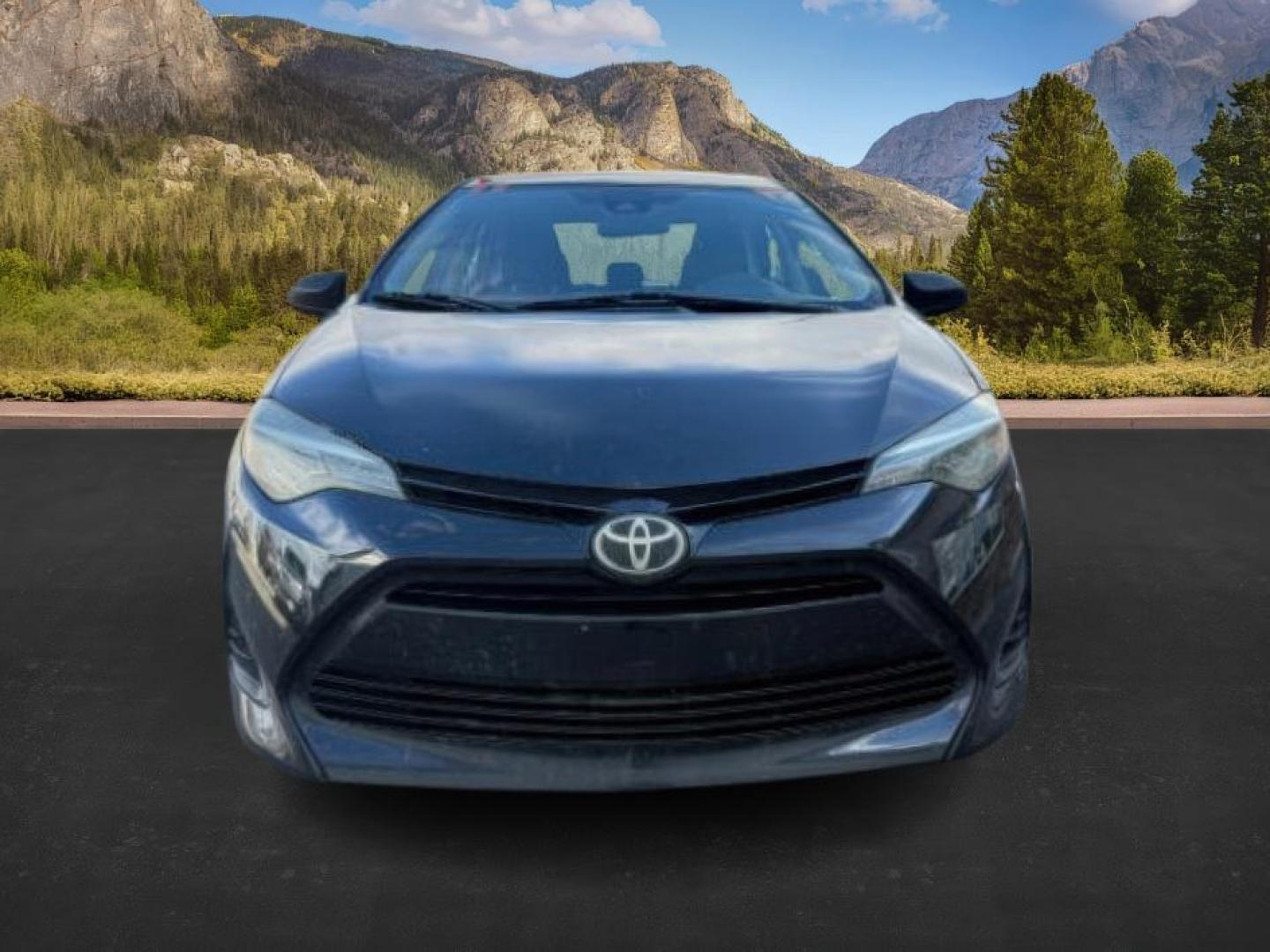 2018 BLACK /Steel Gray Toyota Corolla (5YFBURHE8JP) with an 18L I-4 DOHC engine, Automatic transmission, located at 1175 N Woodruff Ave, Idaho Falls, ID, 83401, 43.506901, -111.999657 - At Timberline Auto, finding a great deal on your next vehicle is always easy! Our experienced sales staff's goal is to help find you the right vehicle at the right price! Our knowledgeable finance department has options for almost any credit score. We offer extended service contract options to prote - Photo#7