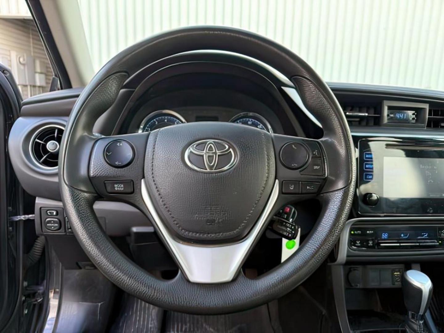 2018 BLACK /Steel Gray Toyota Corolla (5YFBURHE8JP) with an 18L I-4 DOHC engine, Automatic transmission, located at 1175 N Woodruff Ave, Idaho Falls, ID, 83401, 43.506901, -111.999657 - At Timberline Auto, finding a great deal on your next vehicle is always easy! Our experienced sales staff's goal is to help find you the right vehicle at the right price! Our knowledgeable finance department has options for almost any credit score. We offer extended service contract options to prote - Photo#10
