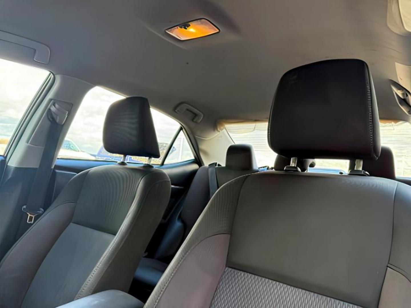 2018 BLACK /Steel Gray Toyota Corolla (5YFBURHE8JP) with an 18L I-4 DOHC engine, Automatic transmission, located at 1175 N Woodruff Ave, Idaho Falls, ID, 83401, 43.506901, -111.999657 - At Timberline Auto, finding a great deal on your next vehicle is always easy! Our experienced sales staff's goal is to help find you the right vehicle at the right price! Our knowledgeable finance department has options for almost any credit score. We offer extended service contract options to prote - Photo#13