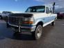 1996 WHITE/BLUE /CLOTH Ford F-250 (1FTHX26G6TE) with an 75L engine, Manual transmission, located at 1175 N Woodruff Ave, Idaho Falls, ID, 83401, 43.506901, -111.999657 - At Timberline Auto, finding a great deal on your next vehicle is always easy! Our experienced sales staff's goal is to help find you the right vehicle at the right price! Our knowledgeable finance department has options for almost any credit score. We offer extended service contract options to prote - Photo#18