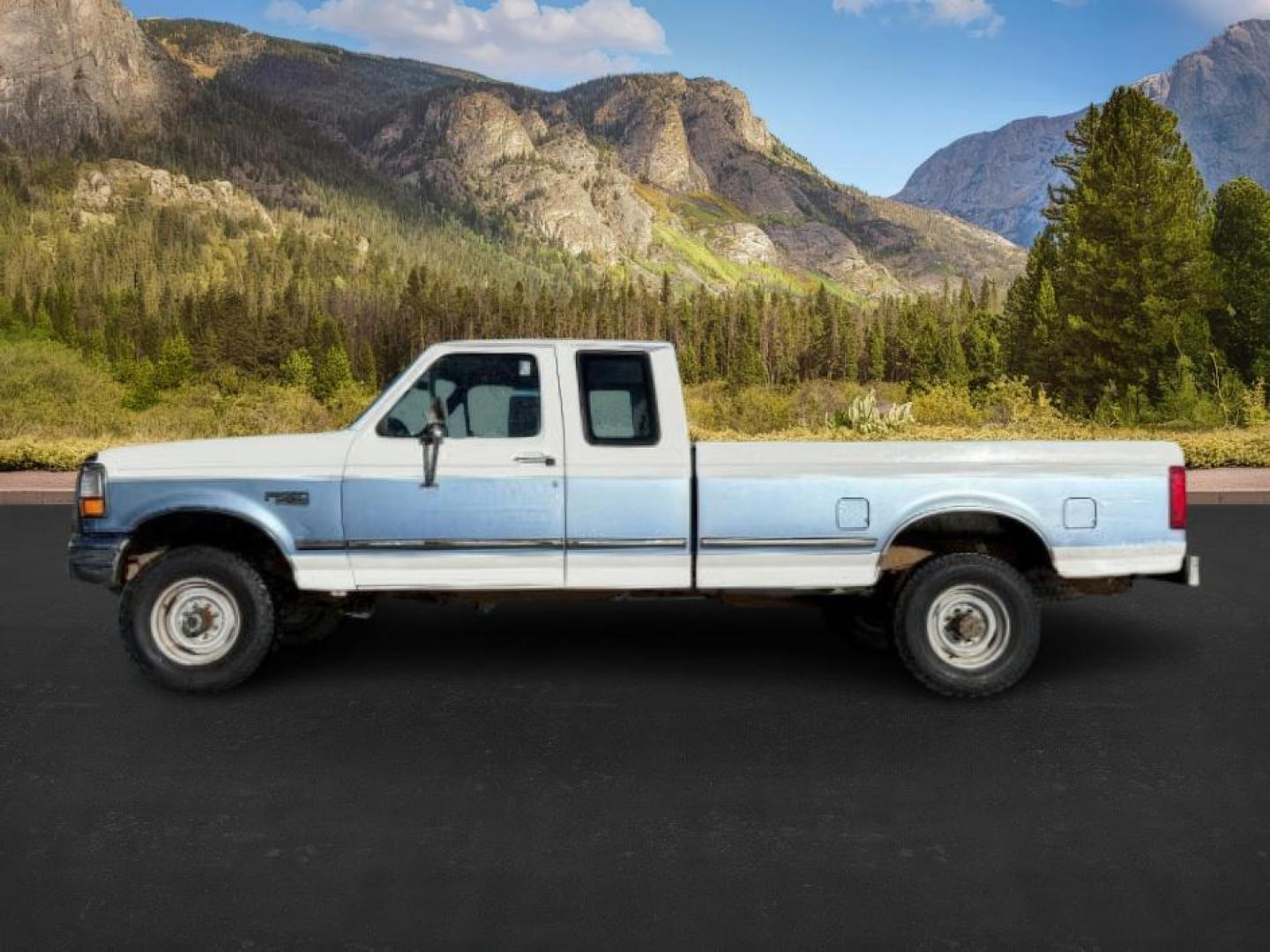 1996 WHITE/BLUE /CLOTH Ford F-250 (1FTHX26G6TE) with an 75L engine, Manual transmission, located at 1175 N Woodruff Ave, Idaho Falls, ID, 83401, 43.506901, -111.999657 - At Timberline Auto, finding a great deal on your next vehicle is always easy! Our experienced sales staff's goal is to help find you the right vehicle at the right price! Our knowledgeable finance department has options for almost any credit score. We offer extended service contract options to prote - Photo#1
