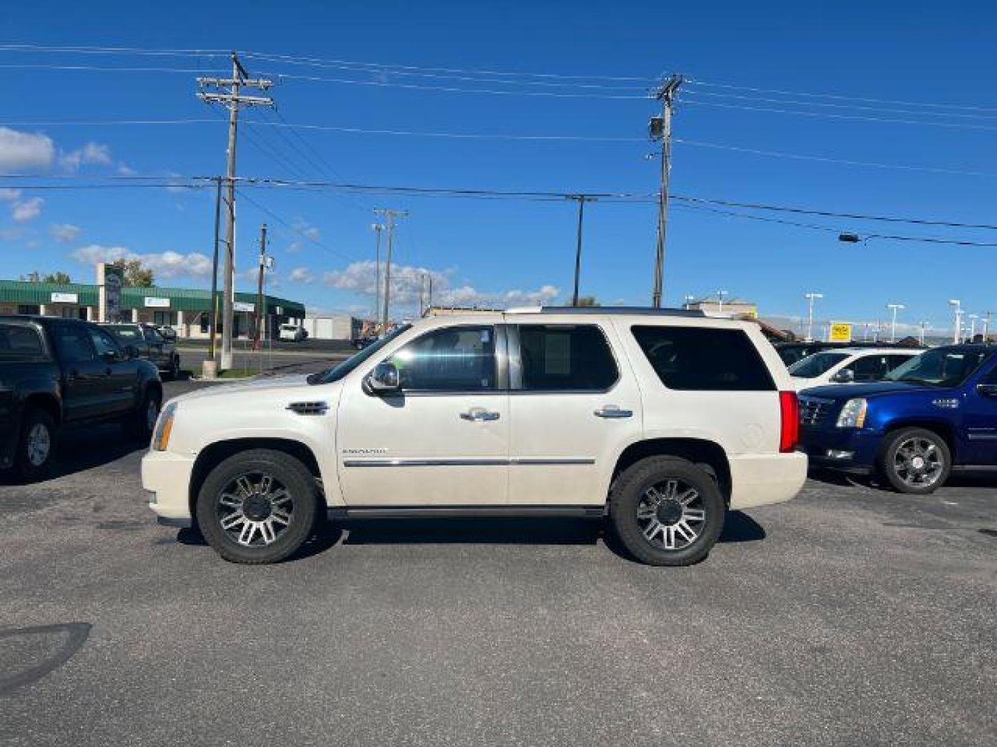 2011 WHITE /Ebony/Ebony Accents Cadillac Escalade (1GYS4CEF1BR) with an Vortec 62L V-8 variable valve control engine, Automatic transmission, located at 1175 N Woodruff Ave, Idaho Falls, ID, 83401, 43.506901, -111.999657 - At Timberline Auto, finding a great deal on your next vehicle is always easy! Our experienced sales staff's goal is to help find you the right vehicle at the right price! Our knowledgeable finance department has options for almost any credit score. We offer extended service contract options to prote - Photo#1