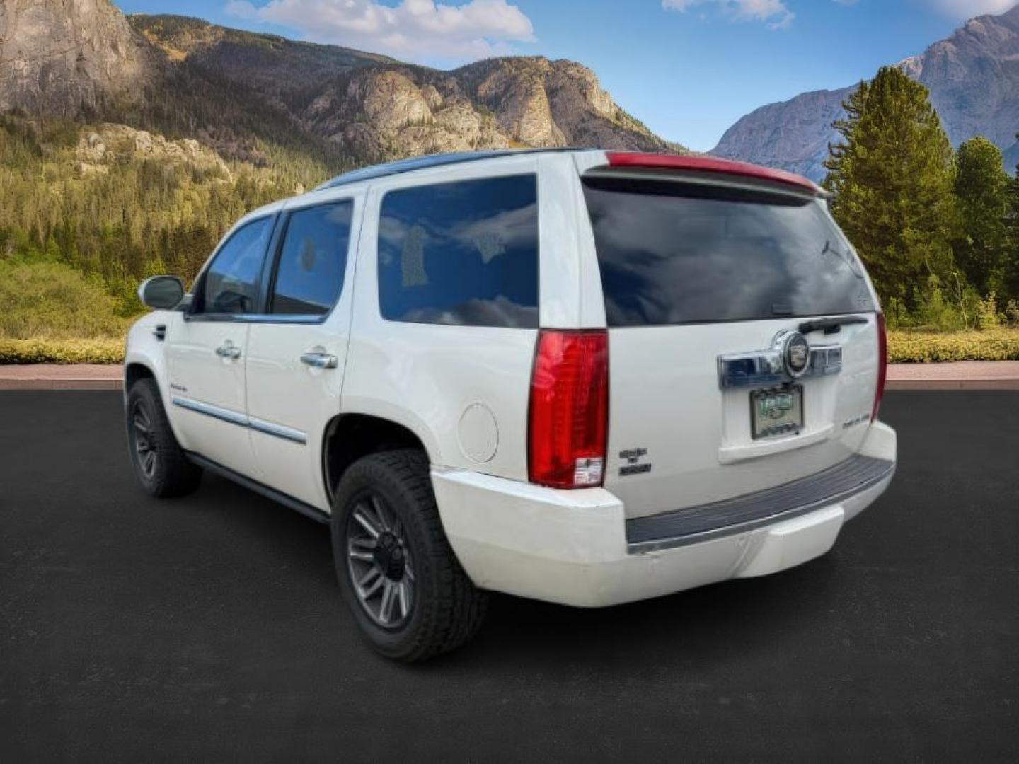 2011 WHITE /Ebony/Ebony Accents Cadillac Escalade (1GYS4CEF1BR) with an Vortec 62L V-8 variable valve control engine, Automatic transmission, located at 1175 N Woodruff Ave, Idaho Falls, ID, 83401, 43.506901, -111.999657 - At Timberline Auto, finding a great deal on your next vehicle is always easy! Our experienced sales staff's goal is to help find you the right vehicle at the right price! Our knowledgeable finance department has options for almost any credit score. We offer extended service contract options to prote - Photo#2