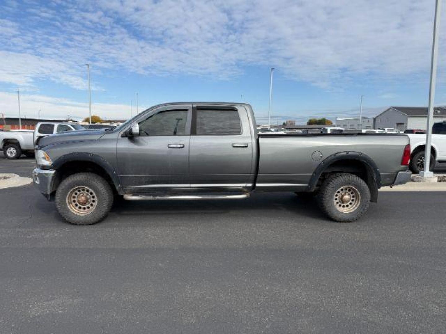 2012 GRAY /LEATHER Ram 2500 (3C6TD5KT3CG) with an 57 V8 engine, Automatic transmission, located at 1175 N Woodruff Ave, Idaho Falls, ID, 83401, 43.506901, -111.999657 - At Timberline Auto, finding a great deal on your next vehicle is always easy! Our experienced sales staff's goal is to help find you the right vehicle at the right price! Our knowledgeable finance department has options for almost any credit score. We offer extended service contract options to prote - Photo#1