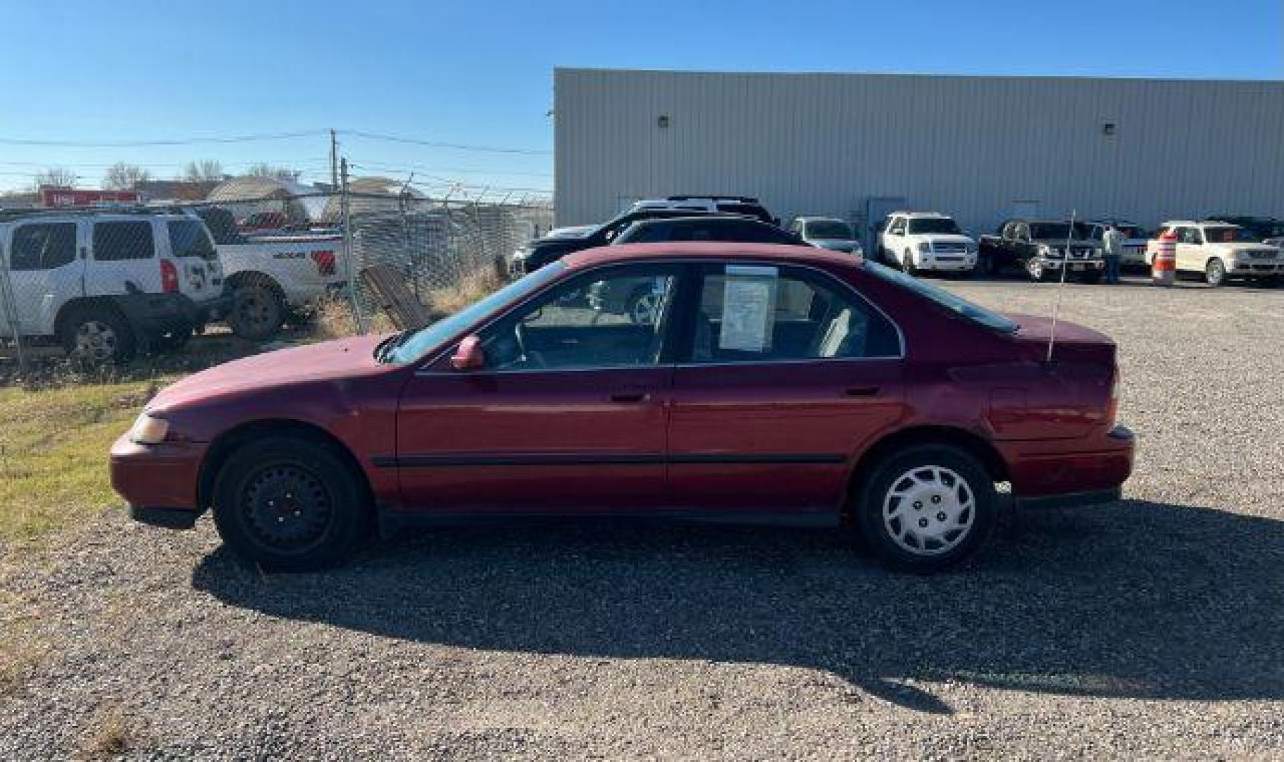 1994 RED /CLOTH Honda Accord (JHMCD5631RC) with an 22L I-4 regular unleaded engine, Automatic transmission, located at 1175 N Woodruff Ave, Idaho Falls, ID, 83401, 43.506901, -111.999657 - At Timberline Auto, finding a great deal on your next vehicle is always easy! Our experienced sales staff's goal is to help find you the right vehicle at the right price! Our knowledgeable finance department has options for almost any credit score. We offer extended service contract options to prote - Photo#1