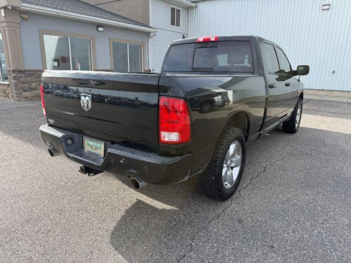 2014 BLACK /CLOTH Ram 1500 (1C6RR7TT3ES) with an 57 V8 engine, Automatic transmission, located at 1175 N Woodruff Ave, Idaho Falls, ID, 83401, 43.506901, -111.999657 - At Timberline Auto, finding a great deal on your next vehicle is always easy! Our experienced sales staff's goal is to help find you the right vehicle at the right price! Our knowledgeable finance department has options for almost any credit score. We offer extended service contract options to prote - Photo#4