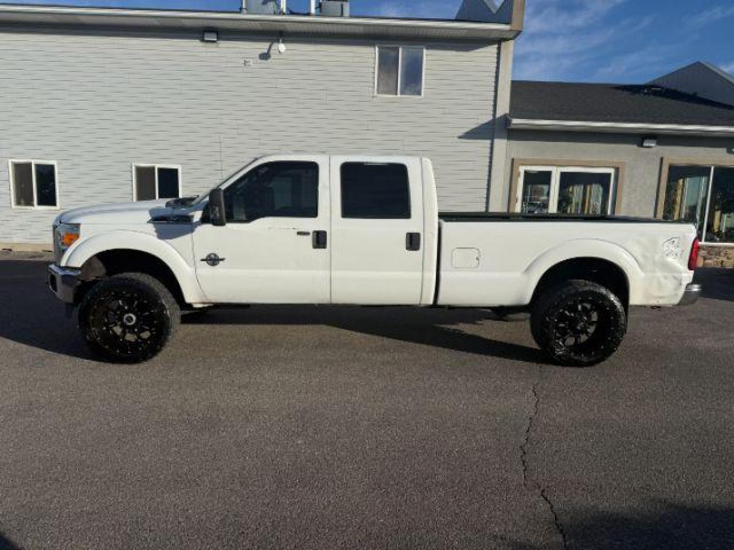 2013 Oxford White /Steel Ford F-350 (1FT8W3BT9DE) with an Powerstroke 67L V-8 diesel direct injection engine, Automatic transmission, located at 1175 N Woodruff Ave, Idaho Falls, ID, 83401, 43.506901, -111.999657 - At Timberline Auto, finding a great deal on your next vehicle is always easy! Our experienced sales staff's goal is to help find you the right vehicle at the right price! Our knowledgeable finance department has options for almost any credit score. We offer extended service contract options to prote - Photo#19