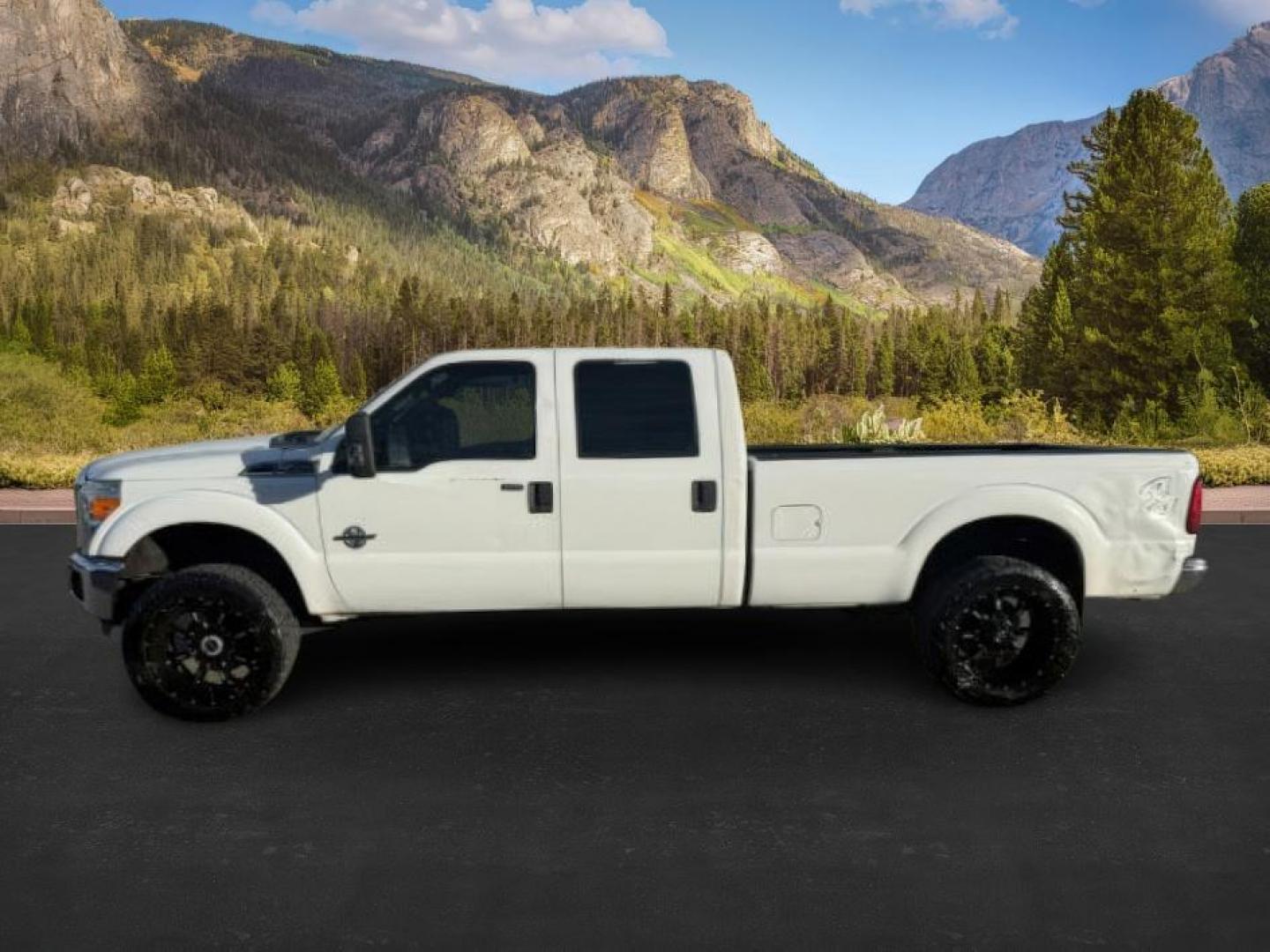 2013 Oxford White /Steel Ford F-350 (1FT8W3BT9DE) with an Powerstroke 67L V-8 diesel direct injection engine, Automatic transmission, located at 1175 N Woodruff Ave, Idaho Falls, ID, 83401, 43.506901, -111.999657 - At Timberline Auto, finding a great deal on your next vehicle is always easy! Our experienced sales staff's goal is to help find you the right vehicle at the right price! Our knowledgeable finance department has options for almost any credit score. We offer extended service contract options to prote - Photo#1