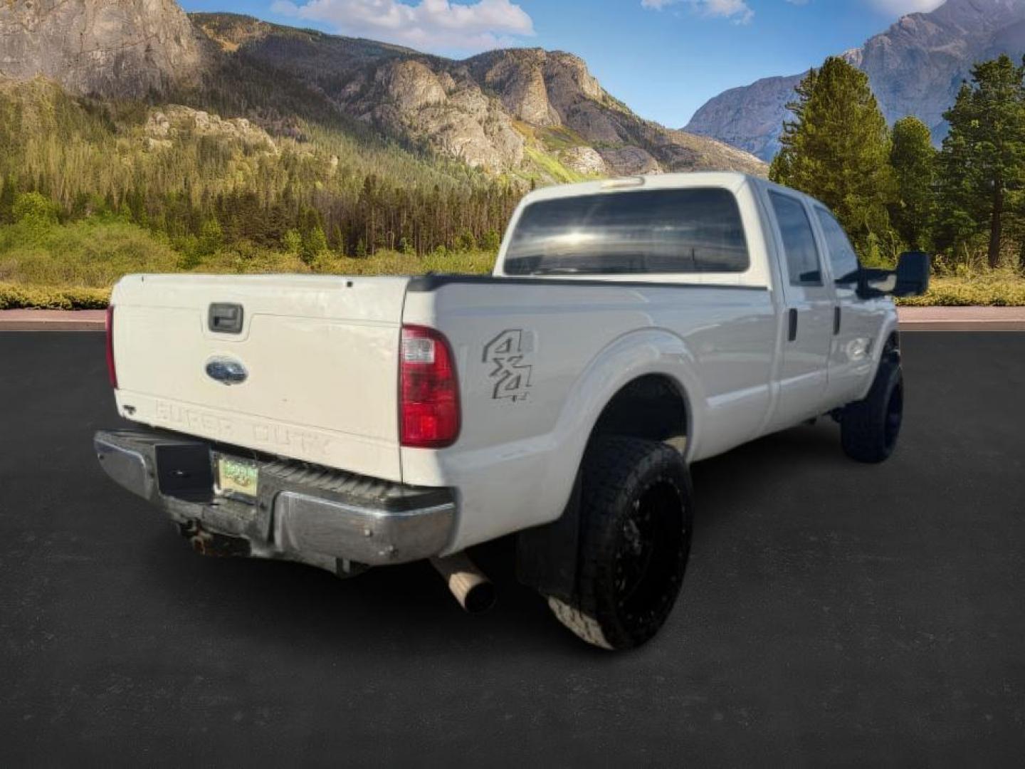 2013 Oxford White /Steel Ford F-350 (1FT8W3BT9DE) with an Powerstroke 67L V-8 diesel direct injection engine, Automatic transmission, located at 1175 N Woodruff Ave, Idaho Falls, ID, 83401, 43.506901, -111.999657 - At Timberline Auto, finding a great deal on your next vehicle is always easy! Our experienced sales staff's goal is to help find you the right vehicle at the right price! Our knowledgeable finance department has options for almost any credit score. We offer extended service contract options to prote - Photo#3