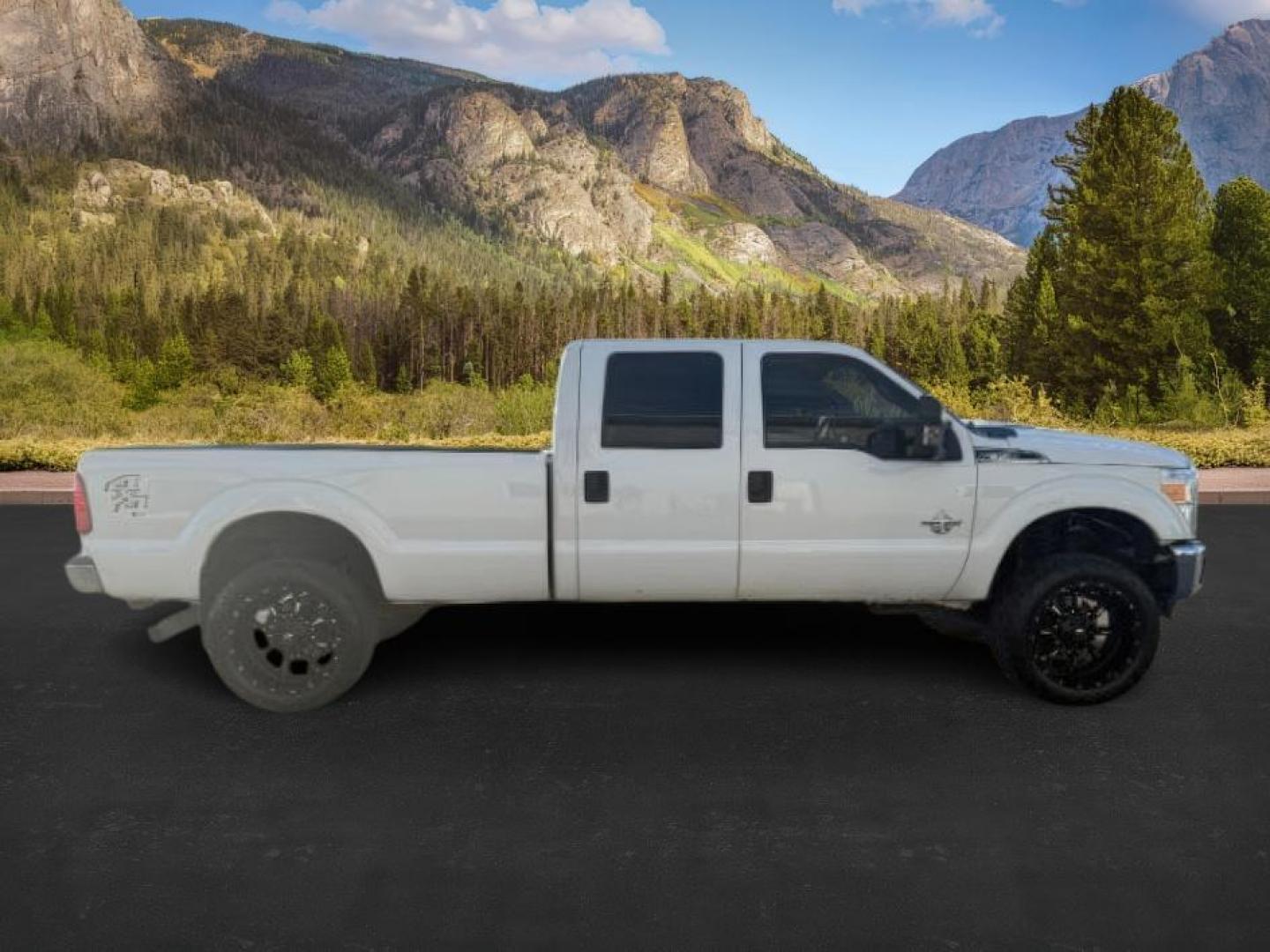 2013 Oxford White /Steel Ford F-350 (1FT8W3BT9DE) with an Powerstroke 67L V-8 diesel direct injection engine, Automatic transmission, located at 1175 N Woodruff Ave, Idaho Falls, ID, 83401, 43.506901, -111.999657 - At Timberline Auto, finding a great deal on your next vehicle is always easy! Our experienced sales staff's goal is to help find you the right vehicle at the right price! Our knowledgeable finance department has options for almost any credit score. We offer extended service contract options to prote - Photo#4