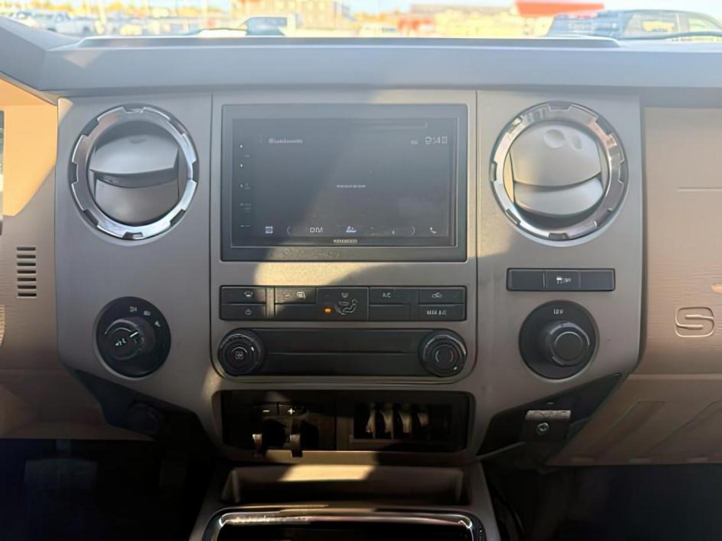 2013 Oxford White /Steel Ford F-350 (1FT8W3BT9DE) with an Powerstroke 67L V-8 diesel direct injection engine, Automatic transmission, located at 1175 N Woodruff Ave, Idaho Falls, ID, 83401, 43.506901, -111.999657 - At Timberline Auto, finding a great deal on your next vehicle is always easy! Our experienced sales staff's goal is to help find you the right vehicle at the right price! Our knowledgeable finance department has options for almost any credit score. We offer extended service contract options to prote - Photo#12