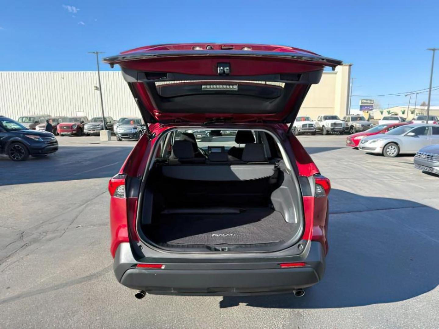 2019 Ruby Flare Pearl /Black Toyota RAV4 LE (2T3H1RFV6KC) with an Dynamic Force 2.5L I-4 port/direct injection engine, AUTOMATIC transmission, located at 1235 N Woodruff Ave., Idaho Falls, 83401, (208) 523-1053, 43.507172, -112.000488 - At Timberline Auto, finding a great deal on your next vehicle is always easy! Our experienced sales staff's goal is to help find you the right vehicle at the right price! Our knowledgeable finance department has options for almost any credit score. We offer extended service contract options to prote - Photo#5