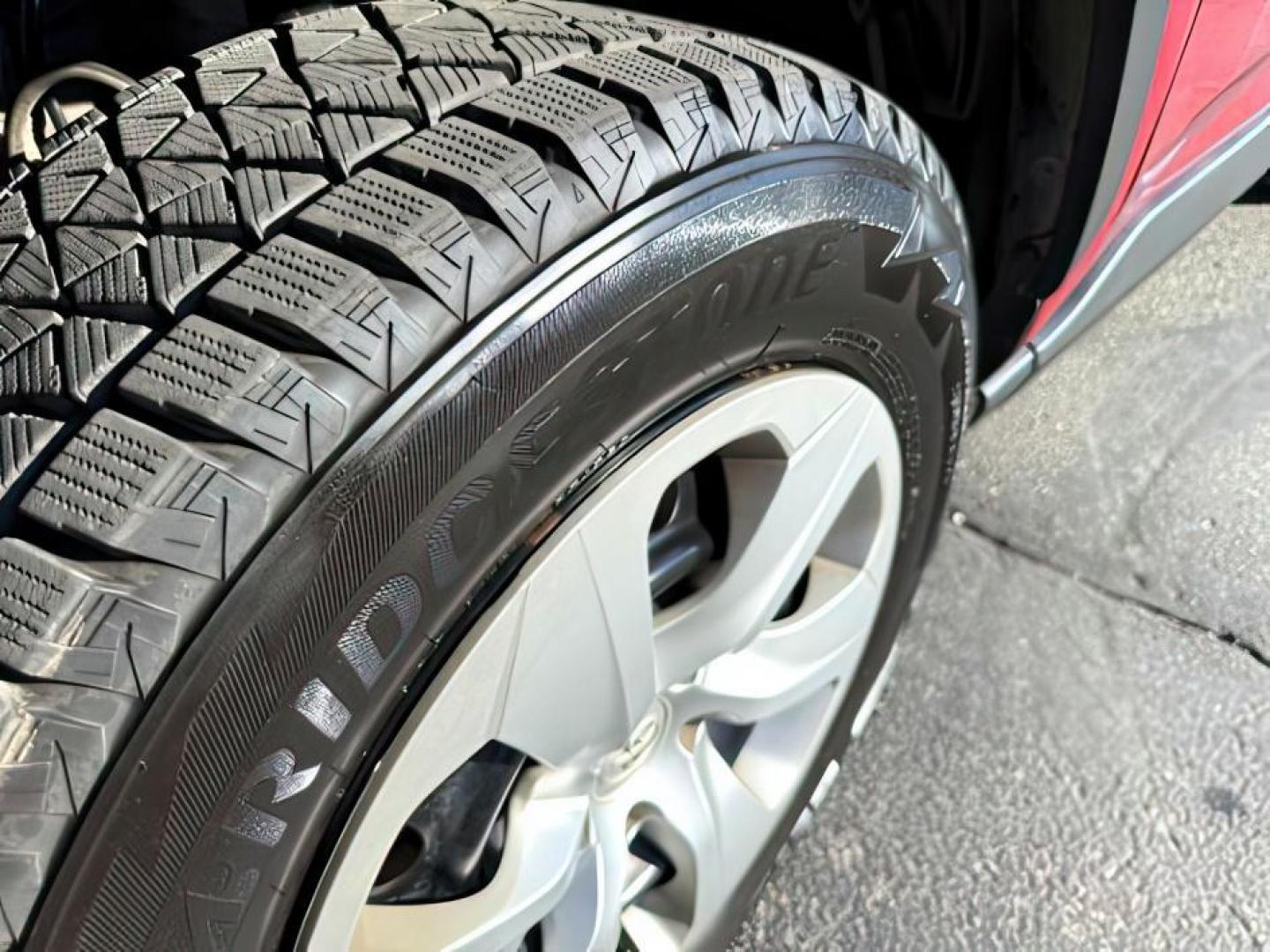 2019 Ruby Flare Pearl /Black Toyota RAV4 LE (2T3H1RFV6KC) with an Dynamic Force 2.5L I-4 port/direct injection engine, AUTOMATIC transmission, located at 1235 N Woodruff Ave., Idaho Falls, 83401, (208) 523-1053, 43.507172, -112.000488 - At Timberline Auto, finding a great deal on your next vehicle is always easy! Our experienced sales staff's goal is to help find you the right vehicle at the right price! Our knowledgeable finance department has options for almost any credit score. We offer extended service contract options to prote - Photo#10