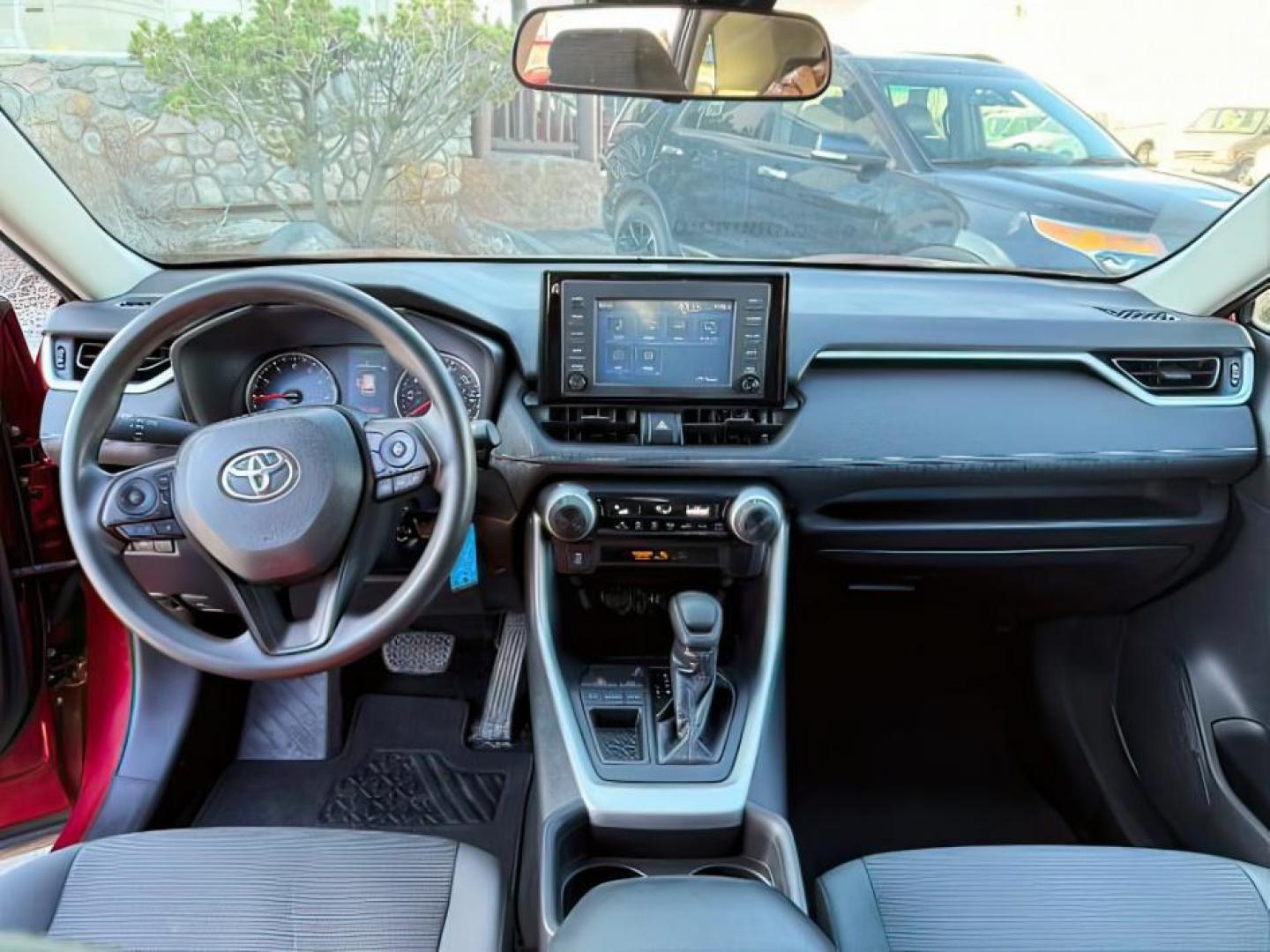 2019 Ruby Flare Pearl /Black Toyota RAV4 LE (2T3H1RFV6KC) with an Dynamic Force 2.5L I-4 port/direct injection engine, AUTOMATIC transmission, located at 1235 N Woodruff Ave., Idaho Falls, 83401, (208) 523-1053, 43.507172, -112.000488 - At Timberline Auto, finding a great deal on your next vehicle is always easy! Our experienced sales staff's goal is to help find you the right vehicle at the right price! Our knowledgeable finance department has options for almost any credit score. We offer extended service contract options to prote - Photo#21