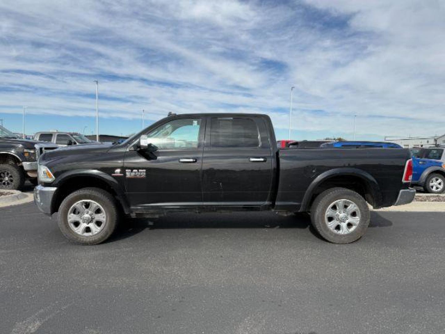 2016 BLACK /Black Ram 2500 (3C6UR5FL4GG) with an Cummins 67L I-6 diesel direct injection engine, Automatic transmission, located at 1175 N Woodruff Ave, Idaho Falls, ID, 83401, 43.506901, -111.999657 - At Timberline Auto, finding a great deal on your next vehicle is always easy! Our experienced sales staff's goal is to help find you the right vehicle at the right price! Our knowledgeable finance department has options for almost any credit score. We offer extended service contract options to prote - Photo#1