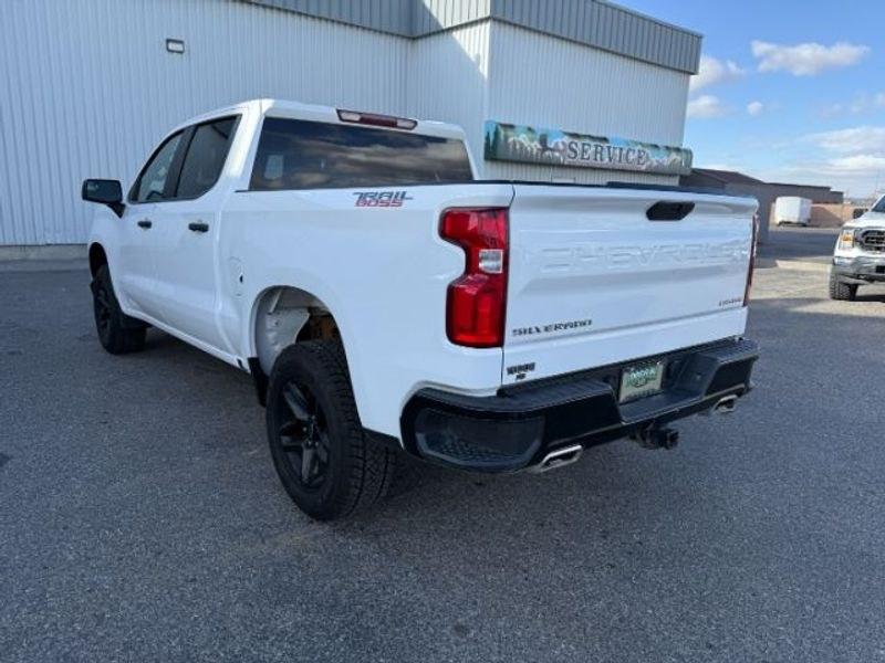 2021 Summit White /Jet Black Chevrolet Silverado Custom Trail Boss (3GCPYCEF3MG) with an V8, 5.3L engine, 6-speed automatic transmission, located at 1175 N Woodruff Ave, Idaho Falls, ID, 83401, 43.506901, -111.999657 - <b>Vehicle Details</b><br>Built for hard work, weekend adventures, and everything in between, this pre-owned 2021 Chevrolet Silverado 1500 Trail Boss Custom delivers the bold capability truck shoppers want. Equipped with 4WD and a powerful V8, 5.3L Gasoline engine, this Chevrolet Silverado is ready- Photo#2