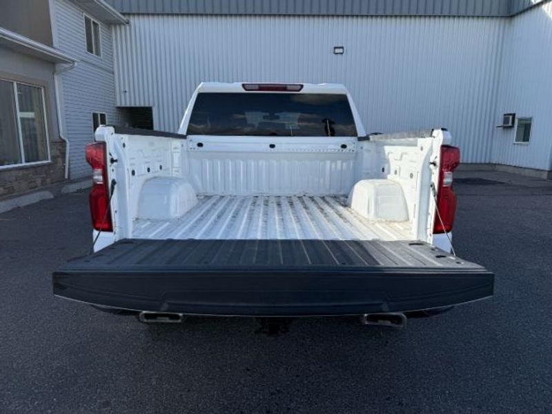 2021 Summit White /Jet Black Chevrolet Silverado Custom Trail Boss (3GCPYCEF3MG) with an V8, 5.3L engine, 6-speed automatic transmission, located at 1175 N Woodruff Ave, Idaho Falls, ID, 83401, 43.506901, -111.999657 - <b>Vehicle Details</b><br>Built for hard work, weekend adventures, and everything in between, this pre-owned 2021 Chevrolet Silverado 1500 Trail Boss Custom delivers the bold capability truck shoppers want. Equipped with 4WD and a powerful V8, 5.3L Gasoline engine, this Chevrolet Silverado is ready- Photo#5
