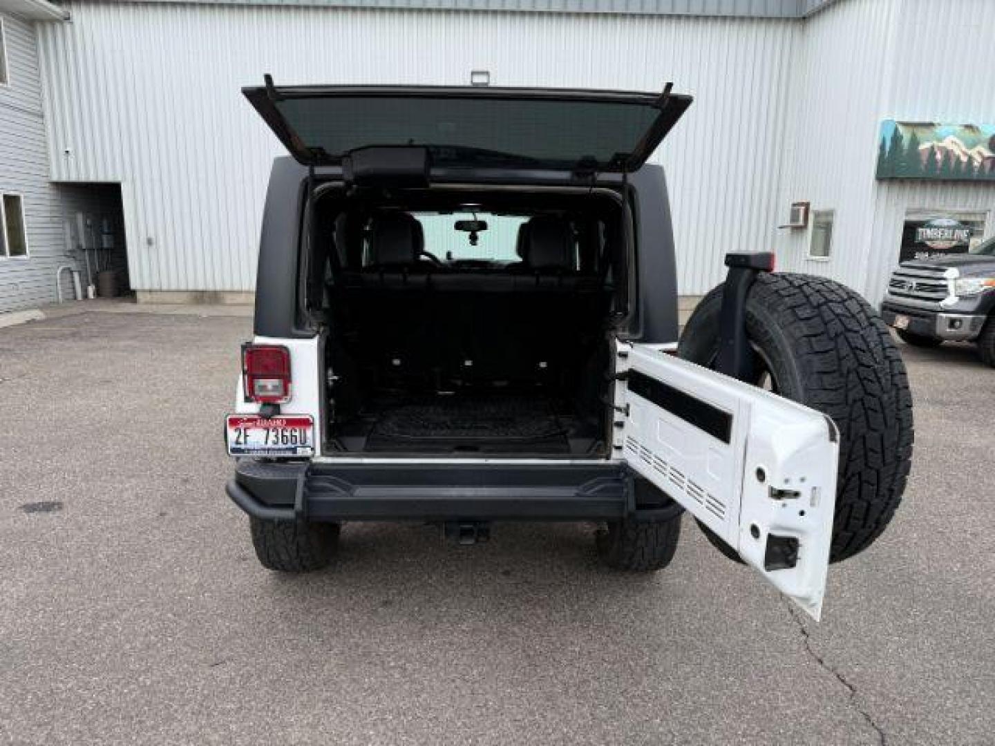 2018 WHITE /Black Jeep Wrangler JK Unlimited Freedom Edition 4x4 (1C4BJWDG3JL) with an Pentastar 3.6L V-6 DOHC engine, AUTOMATIC transmission, located at 1235 N Woodruff Ave., Idaho Falls, 83401, (208) 523-1053, 43.507172, -112.000488 - At Timberline Auto, finding a great deal on your next vehicle is always easy! Our experienced sales staff's goal is to help find you the right vehicle at the right price! Our knowledgeable finance department has options for almost any credit score. We offer extended service contract options to prote - Photo#26
