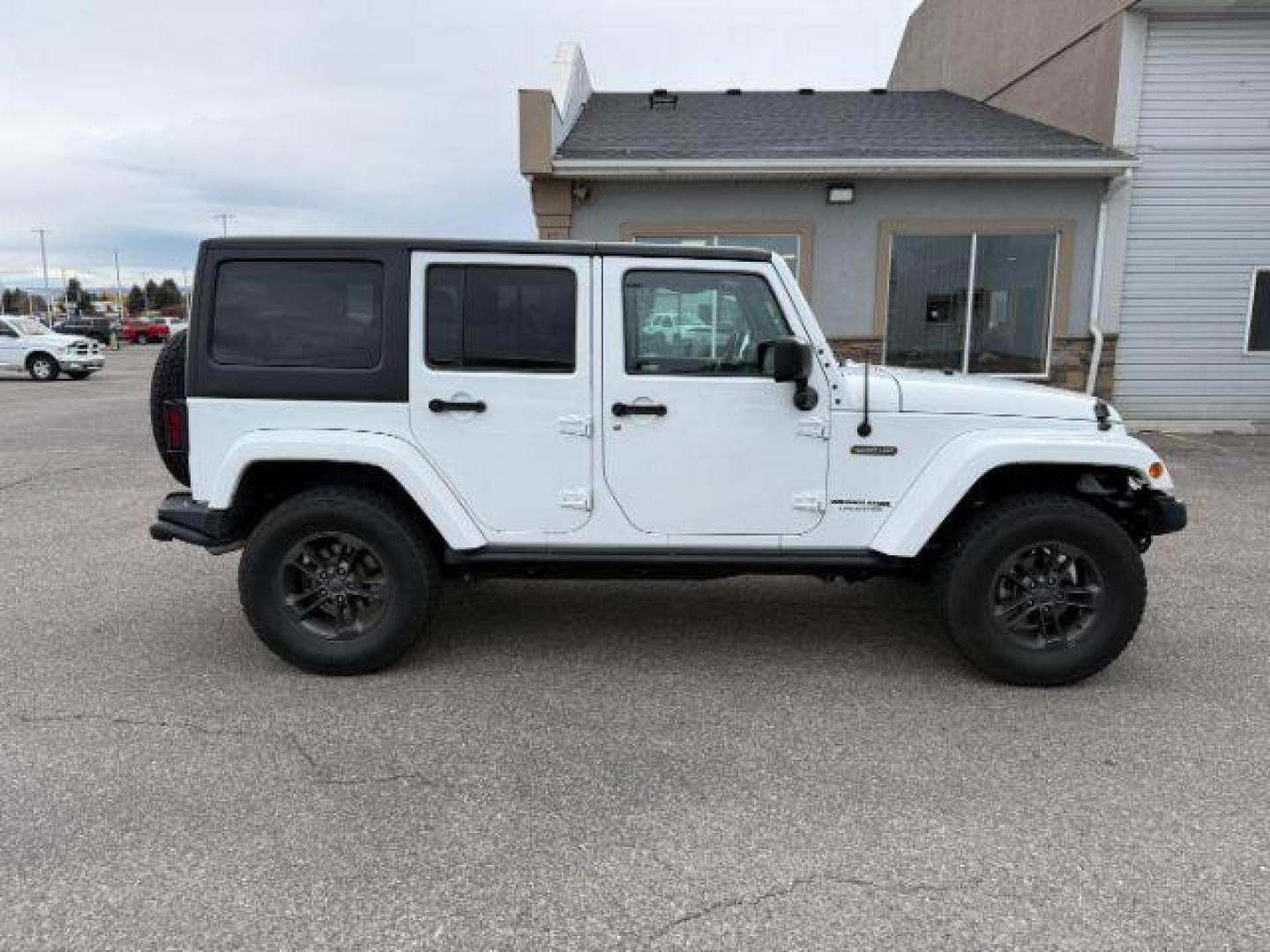2018 WHITE /Black Jeep Wrangler JK Unlimited Freedom Edition 4x4 (1C4BJWDG3JL) with an Pentastar 3.6L V-6 DOHC engine, AUTOMATIC transmission, located at 1235 N Woodruff Ave., Idaho Falls, 83401, (208) 523-1053, 43.507172, -112.000488 - At Timberline Auto, finding a great deal on your next vehicle is always easy! Our experienced sales staff's goal is to help find you the right vehicle at the right price! Our knowledgeable finance department has options for almost any credit score. We offer extended service contract options to prote - Photo#28