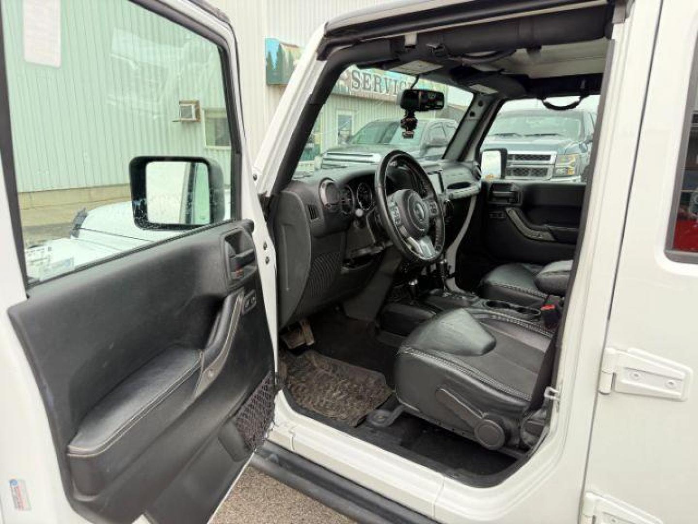 2018 WHITE /Black Jeep Wrangler JK Unlimited Freedom Edition 4x4 (1C4BJWDG3JL) with an Pentastar 3.6L V-6 DOHC engine, AUTOMATIC transmission, located at 1235 N Woodruff Ave., Idaho Falls, 83401, (208) 523-1053, 43.507172, -112.000488 - At Timberline Auto, finding a great deal on your next vehicle is always easy! Our experienced sales staff's goal is to help find you the right vehicle at the right price! Our knowledgeable finance department has options for almost any credit score. We offer extended service contract options to prote - Photo#33