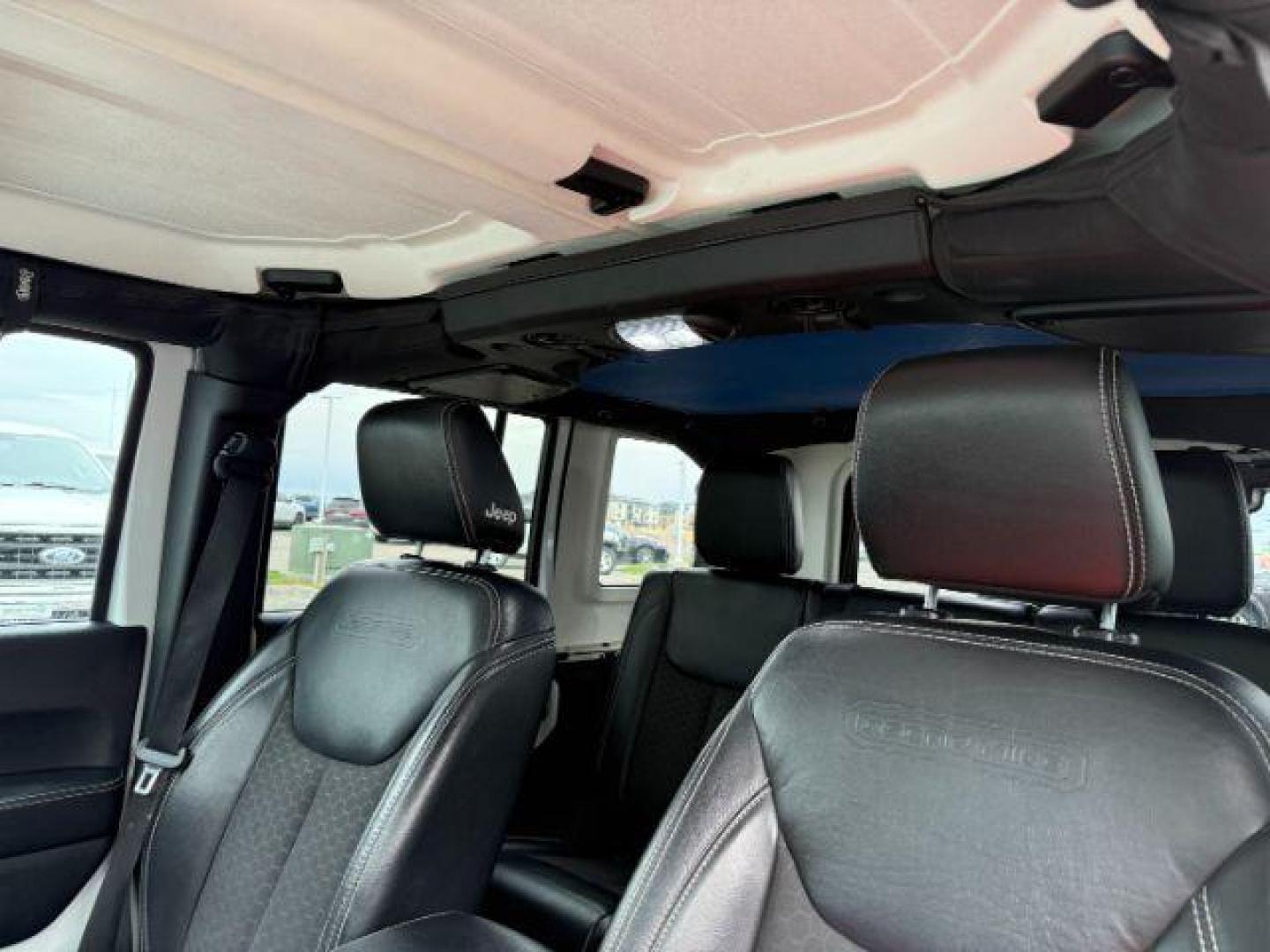 2018 WHITE /Black Jeep Wrangler JK Unlimited Freedom Edition 4x4 (1C4BJWDG3JL) with an Pentastar 3.6L V-6 DOHC engine, AUTOMATIC transmission, located at 1235 N Woodruff Ave., Idaho Falls, 83401, (208) 523-1053, 43.507172, -112.000488 - At Timberline Auto, finding a great deal on your next vehicle is always easy! Our experienced sales staff's goal is to help find you the right vehicle at the right price! Our knowledgeable finance department has options for almost any credit score. We offer extended service contract options to prote - Photo#39