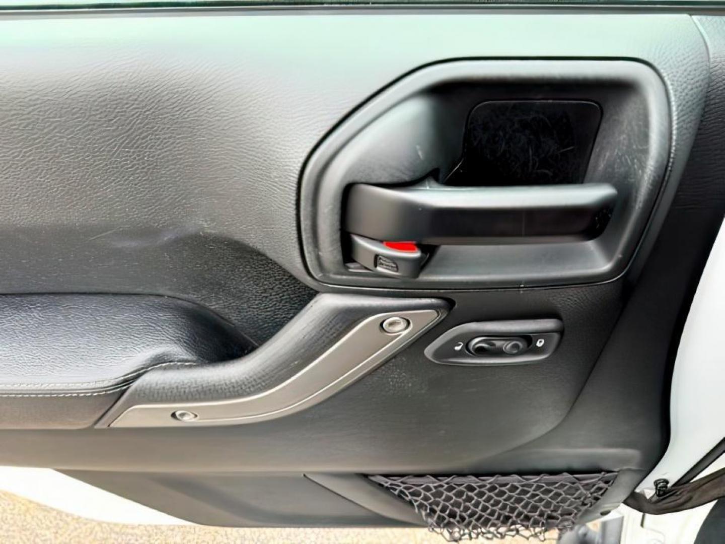 2018 WHITE /Black Jeep Wrangler JK Unlimited Freedom Edition 4x4 (1C4BJWDG3JL) with an Pentastar 3.6L V-6 DOHC engine, AUTOMATIC transmission, located at 1235 N Woodruff Ave., Idaho Falls, 83401, (208) 523-1053, 43.507172, -112.000488 - At Timberline Auto, finding a great deal on your next vehicle is always easy! Our experienced sales staff's goal is to help find you the right vehicle at the right price! Our knowledgeable finance department has options for almost any credit score. We offer extended service contract options to prote - Photo#18