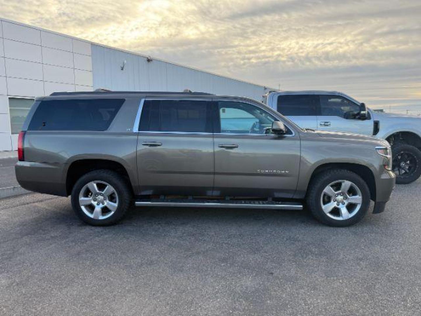 2016 BROWN /Cocoa/Dune Chevrolet Suburban LT (1GNSKHKC5GR) with an EcoTec3 5.3L V-8 gasoline direct injection engine, AUTOMATIC transmission, located at 1235 N Woodruff Ave., Idaho Falls, 83401, (208) 523-1053, 43.507172, -112.000488 - At Timberline Auto, finding a great deal on your next vehicle is always easy! Our experienced sales staff's goal is to help find you the right vehicle at the right price! Our knowledgeable finance department has options for almost any credit score. We offer extended service contract options to prote - Photo#1