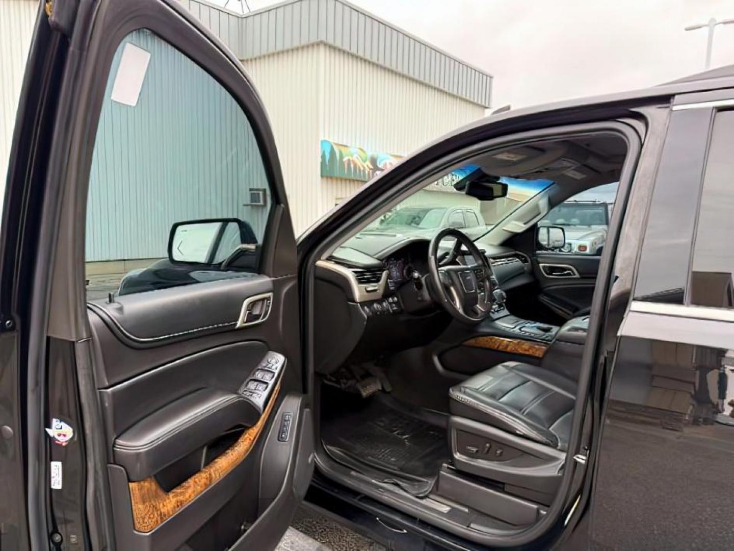2015 BLACK /LEATHER GMC Yukon (1GKS2CKJ8FR) with an 62 V8 engine, Automatic transmission, located at 1175 N Woodruff Ave, Idaho Falls, ID, 83401, 43.506901, -111.999657 - At Timberline Auto, finding a great deal on your next vehicle is always easy! Our experienced sales staff's goal is to help find you the right vehicle at the right price! Our knowledgeable finance department has options for almost any credit score. We offer extended service contract options to prote - Photo#13