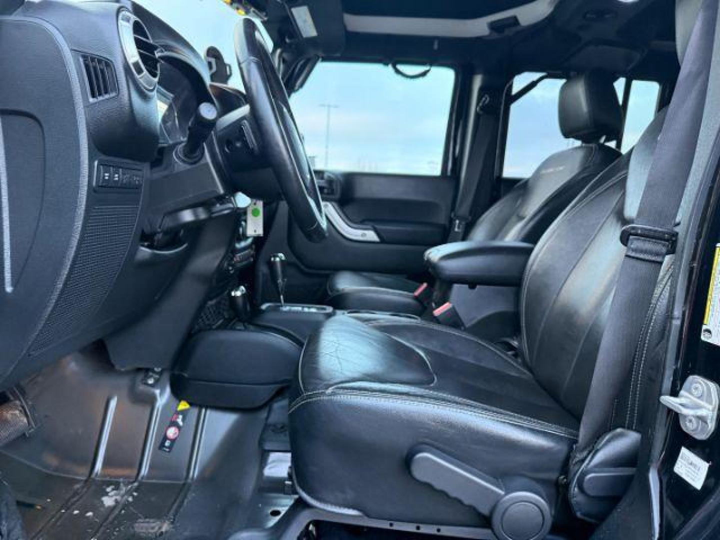 2016 Black Clearcoat /Black Jeep Wrangler Unlimited (1C4BJWFG8GL) with an Pentastar 36L V-6 DOHC engine, Automatic transmission, located at 1175 N Woodruff Ave, Idaho Falls, ID, 83401, 43.506901, -111.999657 - At Timberline Auto, finding a great deal on your next vehicle is always easy! Our experienced sales staff's goal is to help find you the right vehicle at the right price! Our knowledgeable finance department has options for almost any credit score. We offer extended service contract options to prote - Photo#33