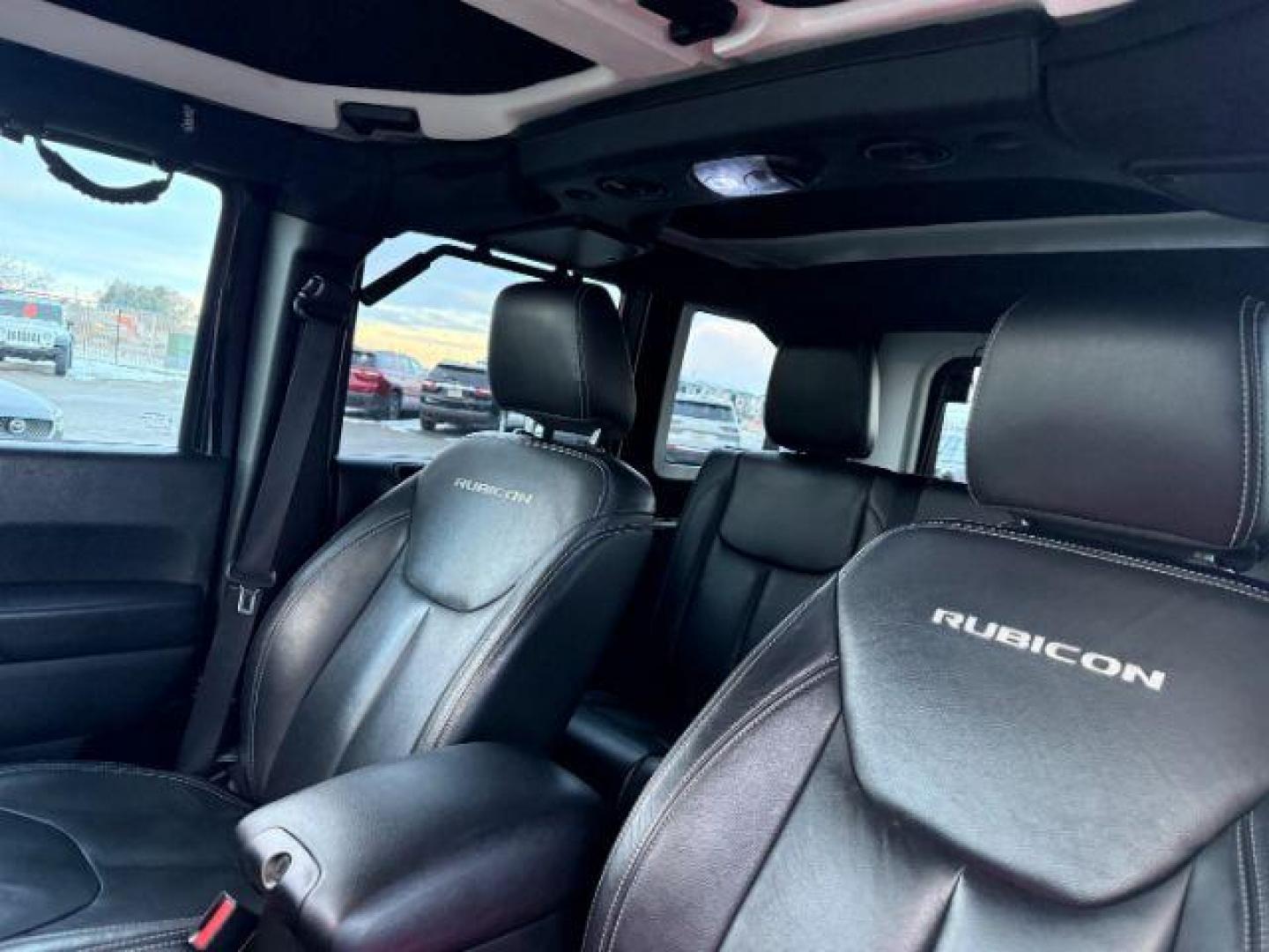 2016 Black Clearcoat /Black Jeep Wrangler Unlimited (1C4BJWFG8GL) with an Pentastar 36L V-6 DOHC engine, Automatic transmission, located at 1175 N Woodruff Ave, Idaho Falls, ID, 83401, 43.506901, -111.999657 - At Timberline Auto, finding a great deal on your next vehicle is always easy! Our experienced sales staff's goal is to help find you the right vehicle at the right price! Our knowledgeable finance department has options for almost any credit score. We offer extended service contract options to prote - Photo#39