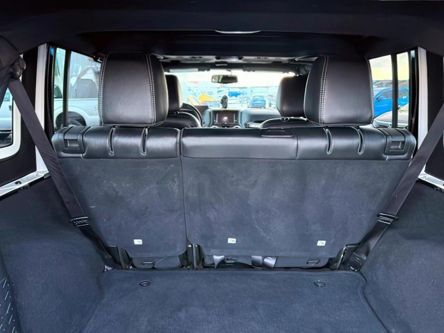 2016 Black Clearcoat /Black Jeep Wrangler Unlimited (1C4BJWFG8GL) with an Pentastar 36L V-6 DOHC engine, Automatic transmission, located at 1175 N Woodruff Ave, Idaho Falls, ID, 83401, 43.506901, -111.999657 - At Timberline Auto, finding a great deal on your next vehicle is always easy! Our experienced sales staff's goal is to help find you the right vehicle at the right price! Our knowledgeable finance department has options for almost any credit score. We offer extended service contract options to prote - Photo#4