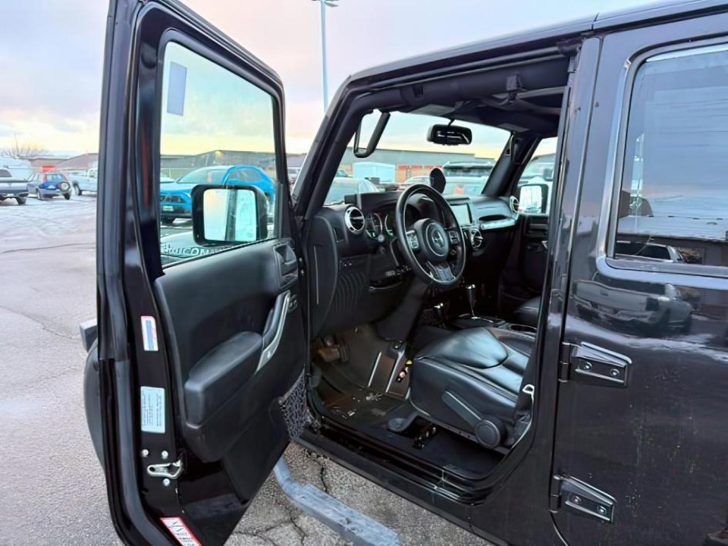 2016 Black Clearcoat /Black Jeep Wrangler Unlimited (1C4BJWFG8GL) with an Pentastar 36L V-6 DOHC engine, Automatic transmission, located at 1175 N Woodruff Ave, Idaho Falls, ID, 83401, 43.506901, -111.999657 - At Timberline Auto, finding a great deal on your next vehicle is always easy! Our experienced sales staff's goal is to help find you the right vehicle at the right price! Our knowledgeable finance department has options for almost any credit score. We offer extended service contract options to prote - Photo#10