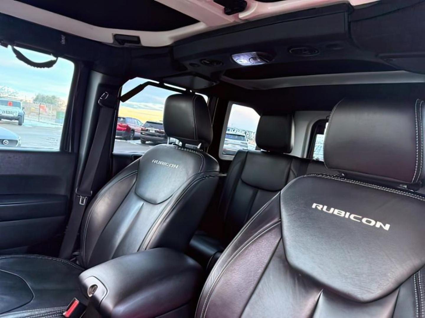 2016 Black Clearcoat /Black Jeep Wrangler Unlimited (1C4BJWFG8GL) with an Pentastar 36L V-6 DOHC engine, Automatic transmission, located at 1175 N Woodruff Ave, Idaho Falls, ID, 83401, 43.506901, -111.999657 - At Timberline Auto, finding a great deal on your next vehicle is always easy! Our experienced sales staff's goal is to help find you the right vehicle at the right price! Our knowledgeable finance department has options for almost any credit score. We offer extended service contract options to prote - Photo#17