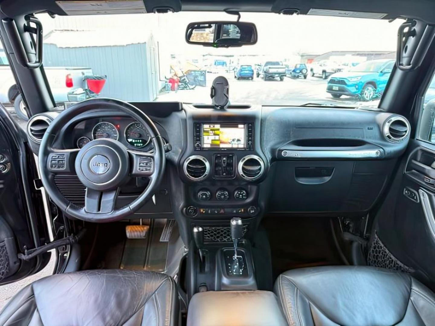 2016 Black Clearcoat /Black Jeep Wrangler Unlimited (1C4BJWFG8GL) with an Pentastar 36L V-6 DOHC engine, Automatic transmission, located at 1175 N Woodruff Ave, Idaho Falls, ID, 83401, 43.506901, -111.999657 - At Timberline Auto, finding a great deal on your next vehicle is always easy! Our experienced sales staff's goal is to help find you the right vehicle at the right price! Our knowledgeable finance department has options for almost any credit score. We offer extended service contract options to prote - Photo#19