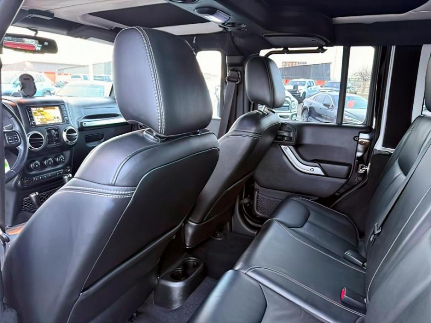 2016 Black Clearcoat /Black Jeep Wrangler Unlimited (1C4BJWFG8GL) with an Pentastar 36L V-6 DOHC engine, Automatic transmission, located at 1175 N Woodruff Ave, Idaho Falls, ID, 83401, 43.506901, -111.999657 - At Timberline Auto, finding a great deal on your next vehicle is always easy! Our experienced sales staff's goal is to help find you the right vehicle at the right price! Our knowledgeable finance department has options for almost any credit score. We offer extended service contract options to prote - Photo#20