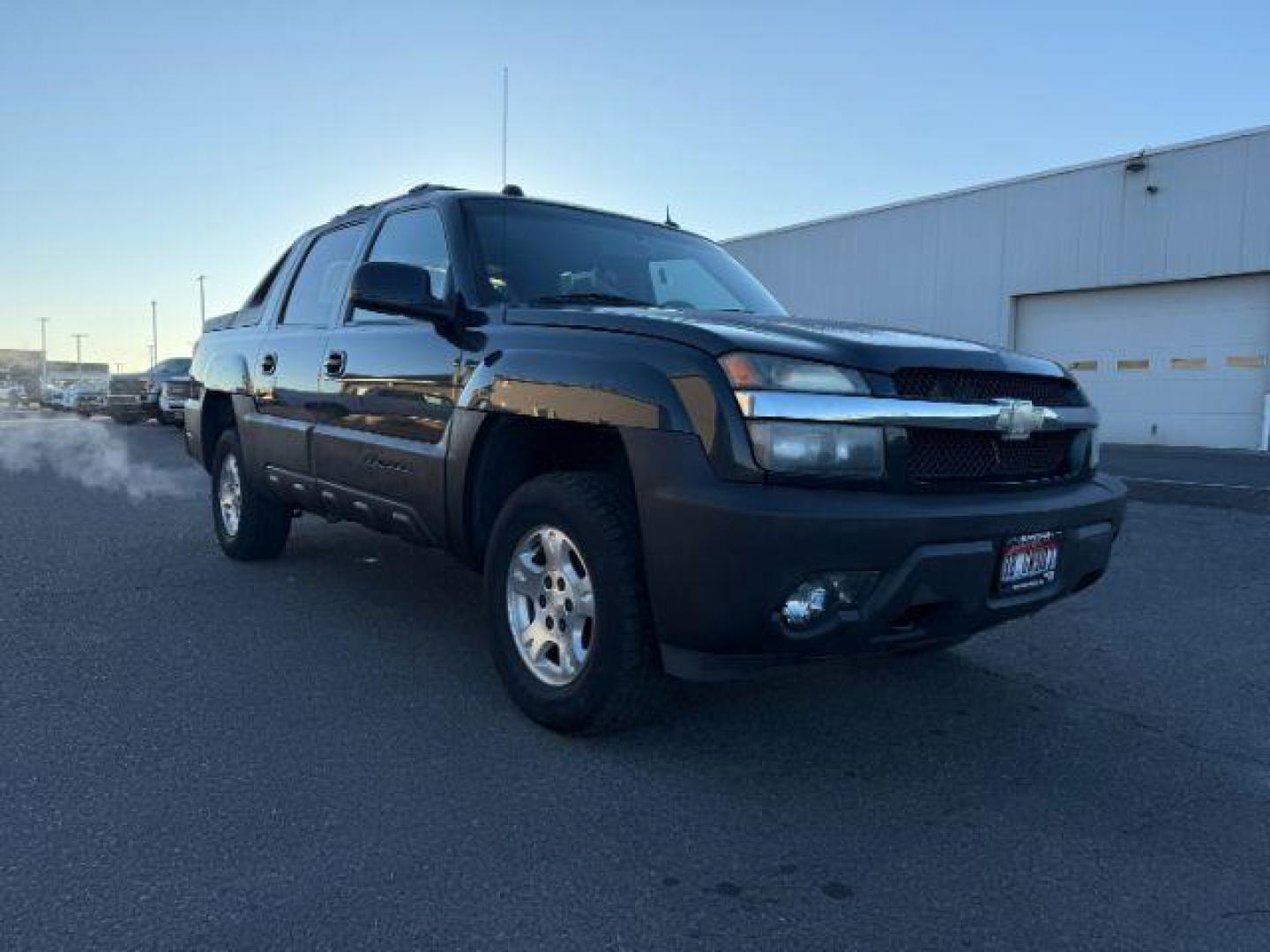 2005 BLACK /Gray/Dark Charcoal Chevrolet Avalanche 1500 (3GNEK12Z15G) with an 53 engine, Automatic transmission, located at 1175 N Woodruff Ave, Idaho Falls, ID, 83401, 43.506901, -111.999657 - At Timberline Auto, finding a great deal on your next vehicle is always easy! Our experienced sales staff's goal is to help find you the right vehicle at the right price! Our knowledgeable finance department has options for almost any credit score. We offer extended service contract options to prote - Photo#29