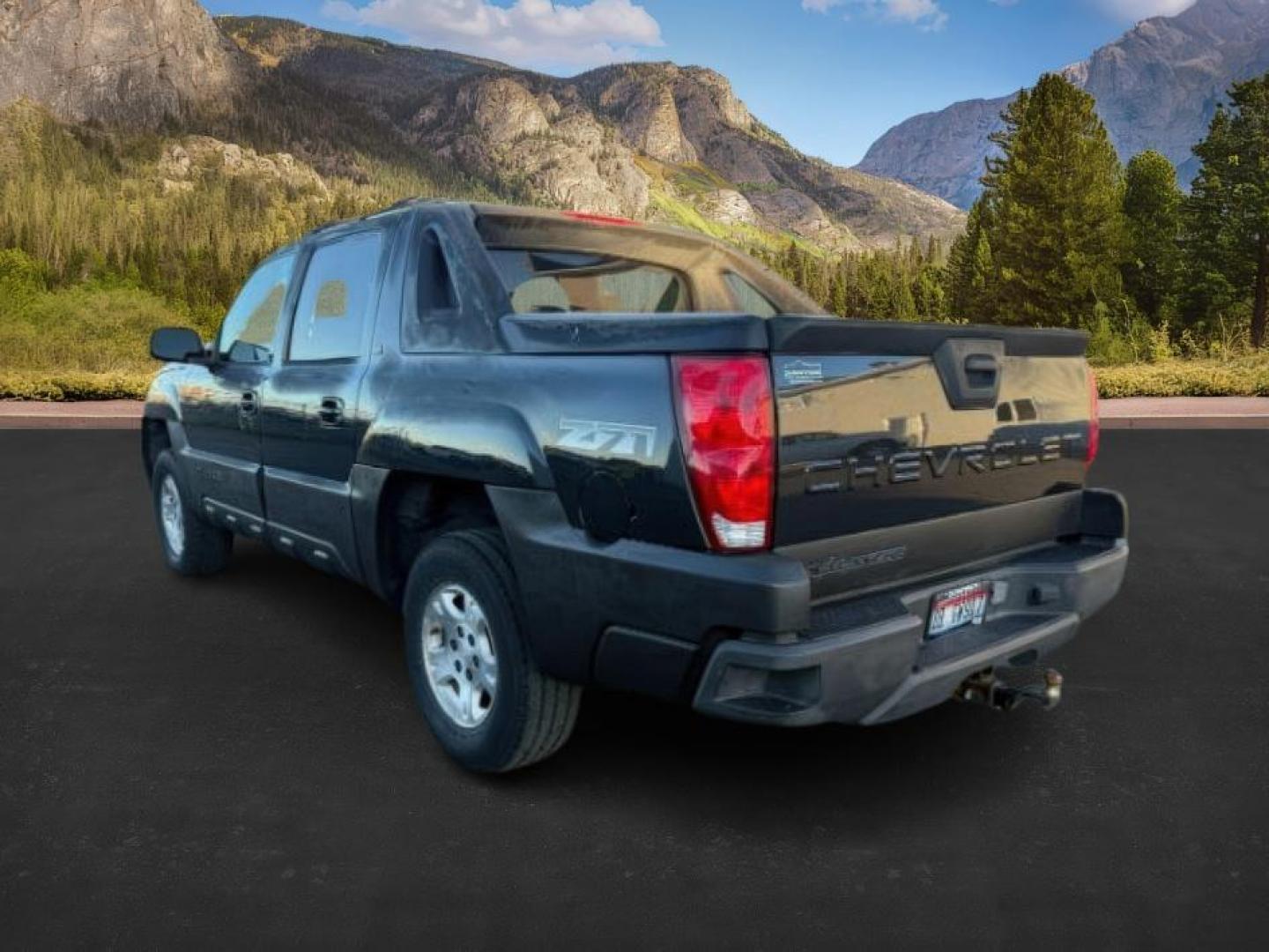 2005 BLACK /Gray/Dark Charcoal Chevrolet Avalanche 1500 (3GNEK12Z15G) with an 53 engine, Automatic transmission, located at 1175 N Woodruff Ave, Idaho Falls, ID, 83401, 43.506901, -111.999657 - At Timberline Auto, finding a great deal on your next vehicle is always easy! Our experienced sales staff's goal is to help find you the right vehicle at the right price! Our knowledgeable finance department has options for almost any credit score. We offer extended service contract options to prote - Photo#2